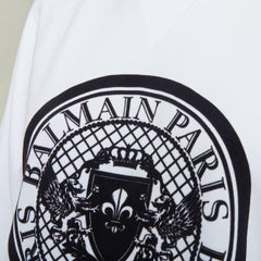 BALMAIN white cotton black flocked coin medallion logo print raglan sweatshirt