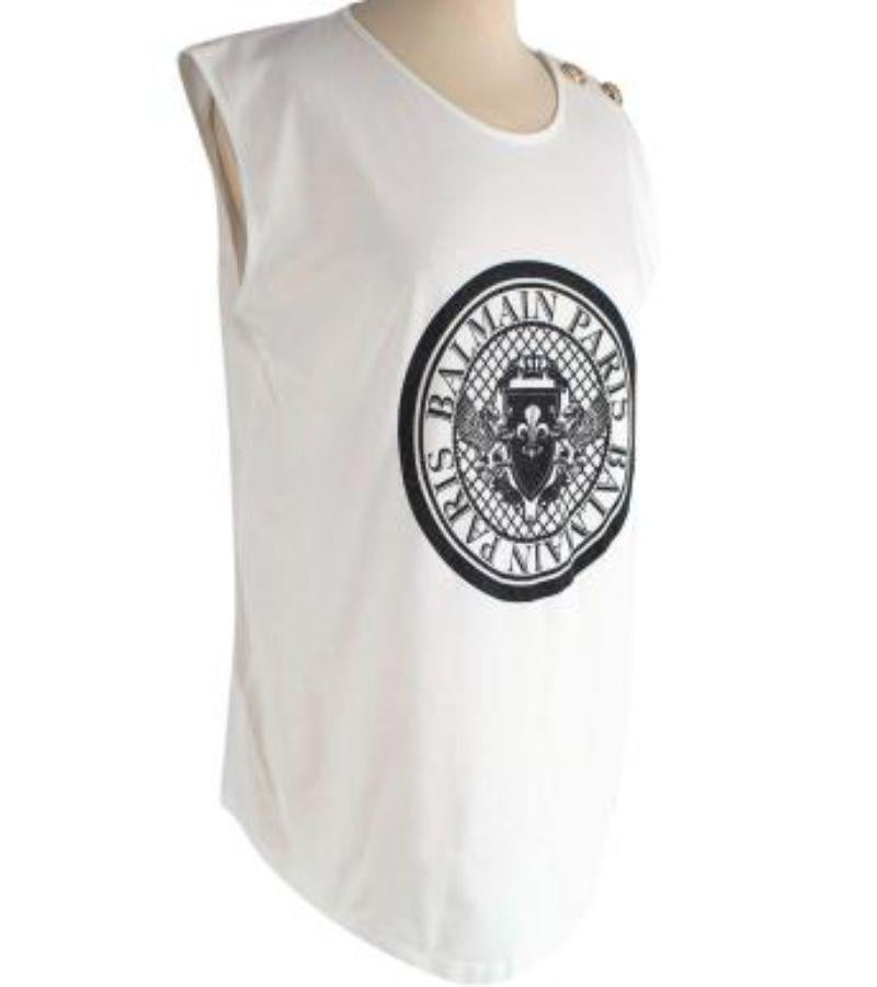 Balmain White cotton logo t-shirt

-Black logo print at the front 
-Gold tone buttons on shoulder 
-Round neckline 
-Sleeveless 
-Relaxed fit 

Material: 

100% Cotton 

Made in Portugal 

9.5/10 excellent condition

PLEASE NOTE, THESE ITEMS ARE