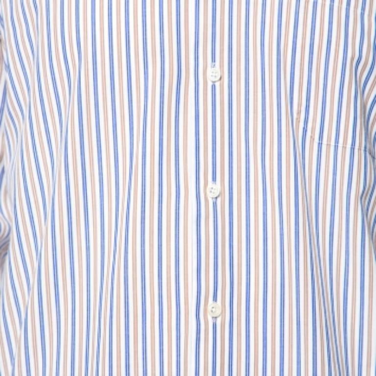 For a smart, formal look, this Balmain creation is a must-have in your closet. This cotton shirt flaunts a striped design. It features front buttons, long sleeves with buttoned cuffs, and pointed collars. Team this up with dark trousers to complete