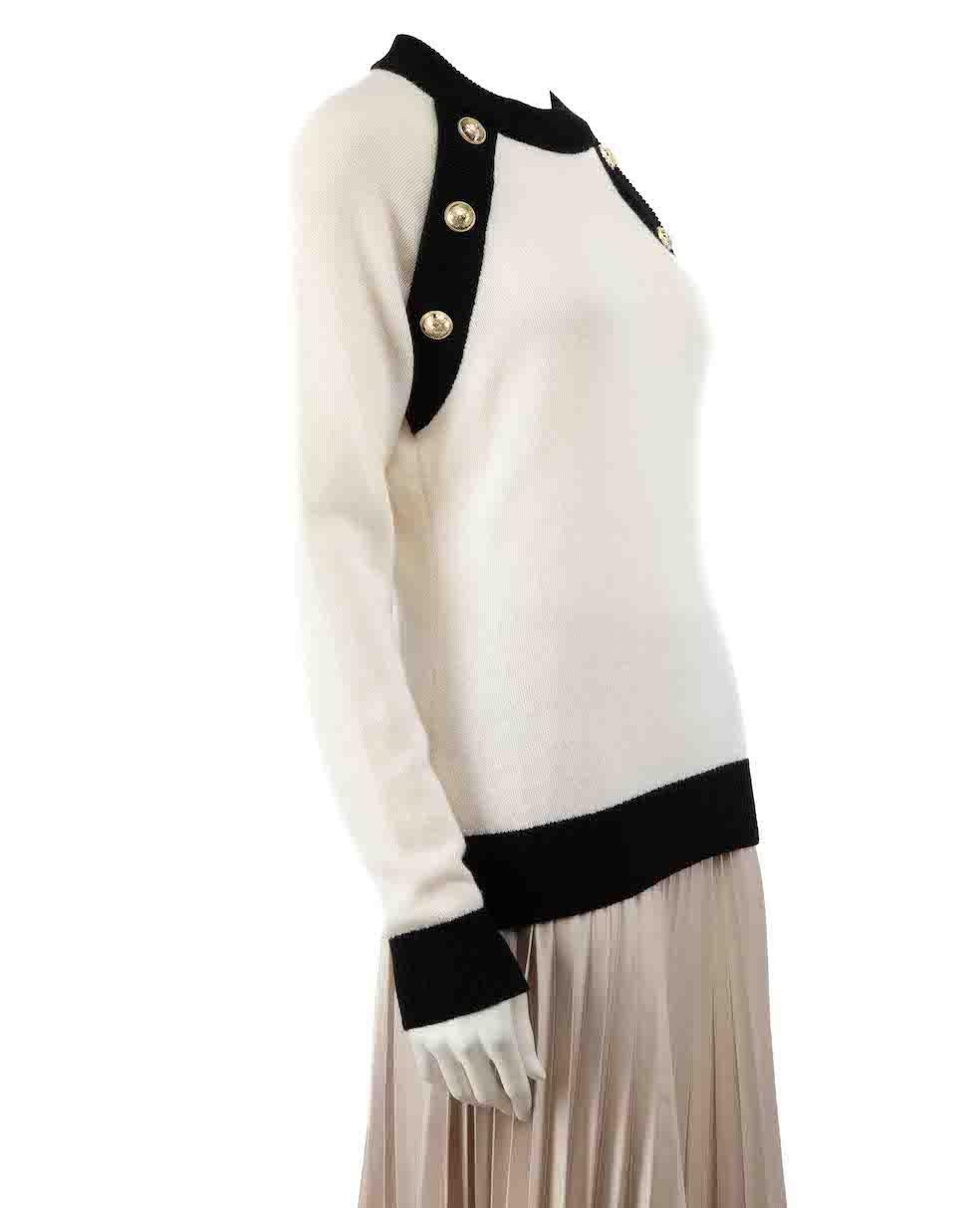CONDITION is Very good. Minimal wear to jumper is evident. Brand label is partially detached. Minimal wear to the texture with light pilling to the knit on this used Balmain designer resale item.
 
 
 
 Details
 
 
 White
 
 Wool
 
 Knit jumper
 
