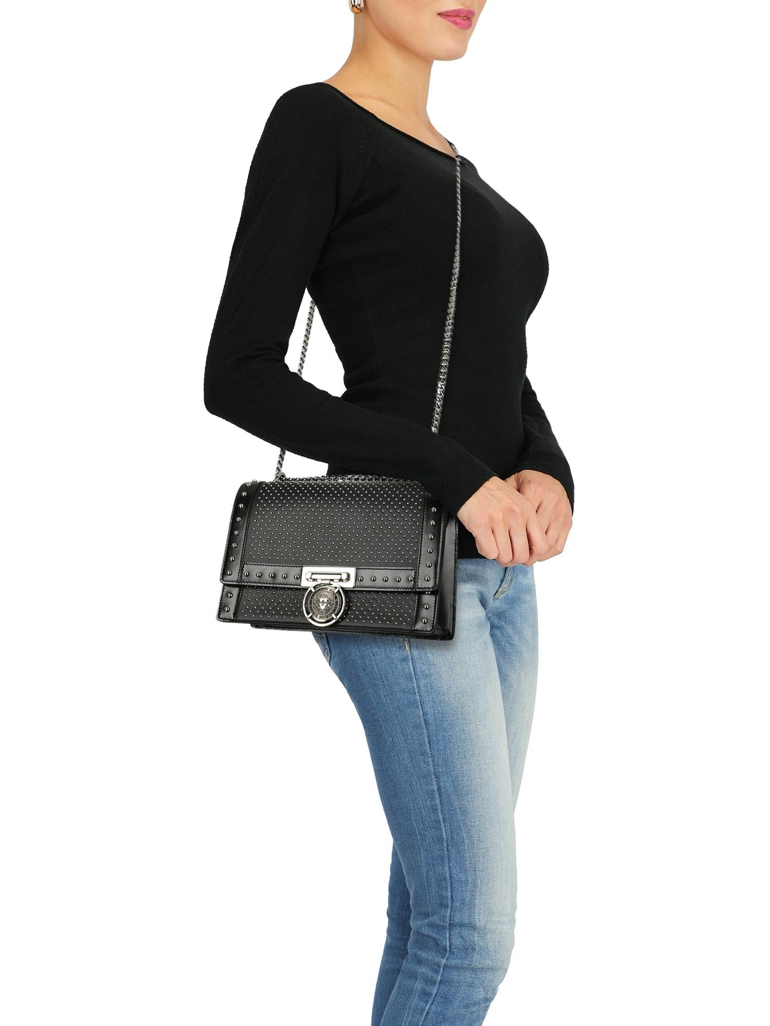Bag, leather, solid color, front logo, turn-lock closure, silver-tone hardware, internal pocket, rockstud embellishment, evening

Includes: N/A

Product Condition: Very Good
Lining: visible signs. External Leather: visible