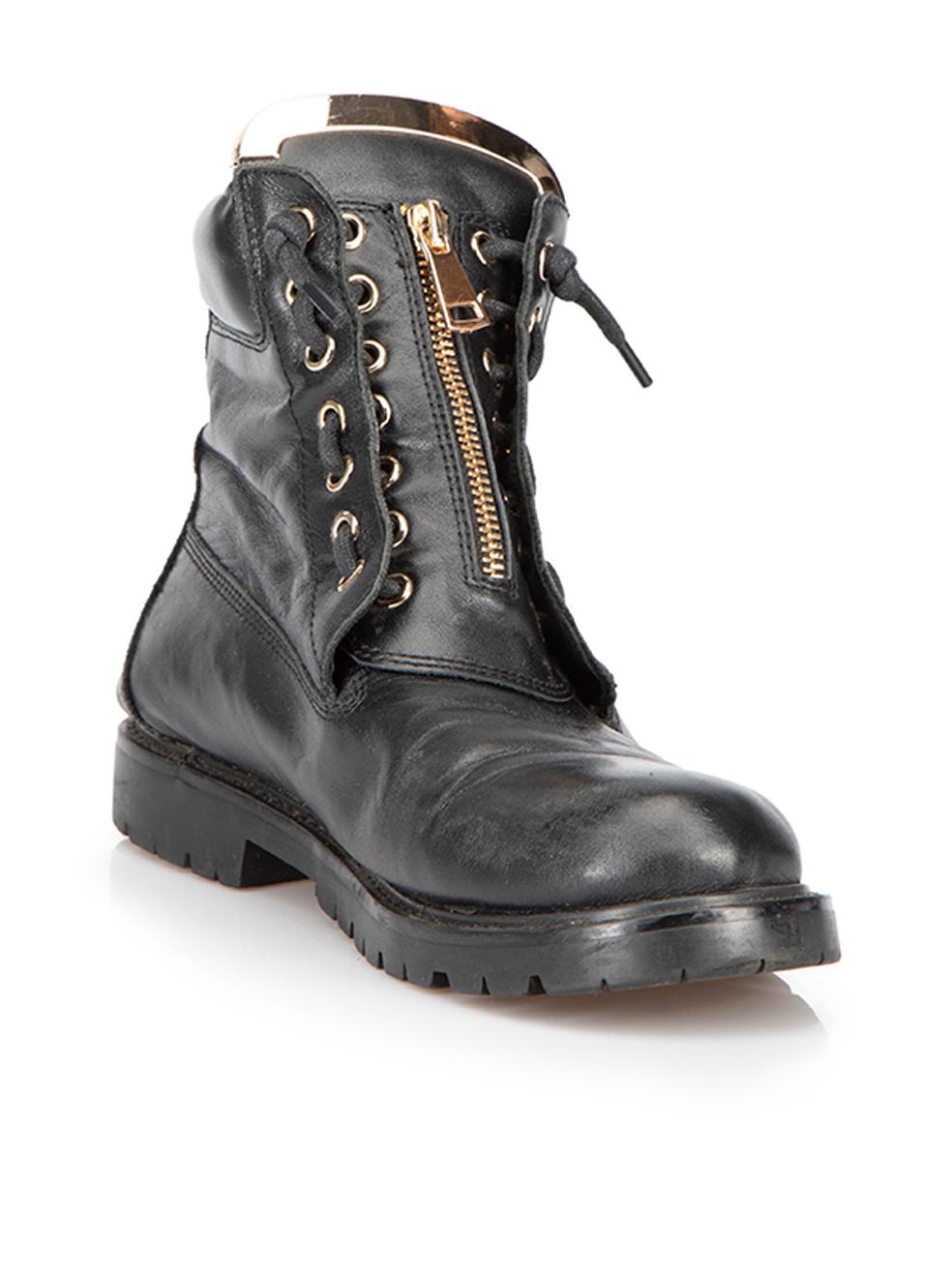 CONDITION is Good. Minor wear to boots is evident. Light wear to the leather exterior where scuffs and scratches can be seen. There is also visible creasing to the vamp on this used Balmain designer resale item. 
 
 Details
  Black
 Leather
 Combat