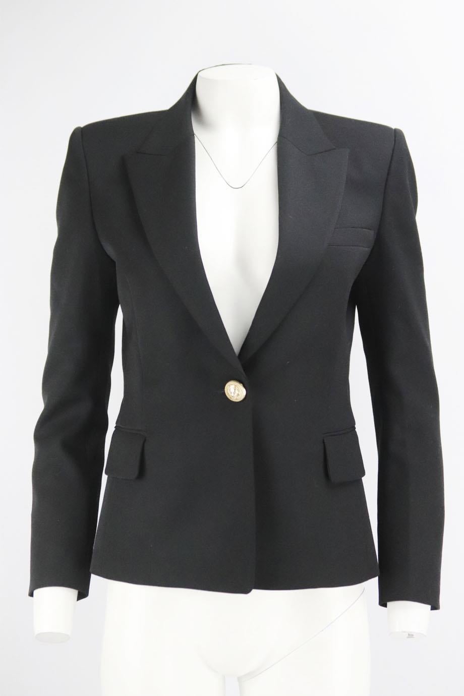 Balmain wool blazer. Black. Long sleeve, v-neck. Button fastening at front. 100% Wool; lining: 52% viscose, 48% cotton. Size: FR 40 (UK 12, US 8, IT 44). Shoulder to shoulder: 15.5 in. Bust: 36 in. Waist: 32 in. Hips: 38 in. Length: 26 in Very good