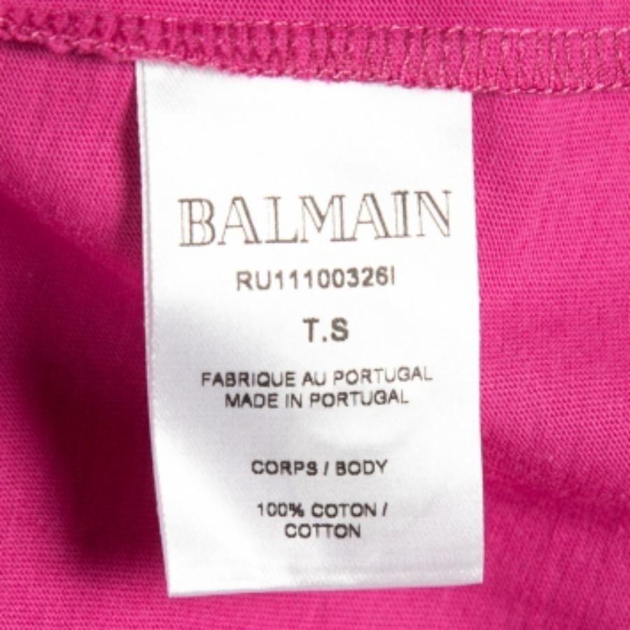 Combinaison parfaite de confort, de luxe et de style, ce t-shirt Balmain X Beyonce est une pièce incontournable ! Confectionnée à partir de matériaux de qualité, cette création s'associera à un pantalon en jean et à des baskets pour un look cool.