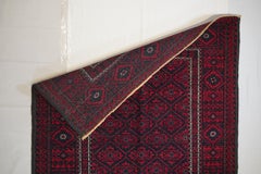 Balouchi red and black  Vintage Semi Antique carpet  mid 20th-century