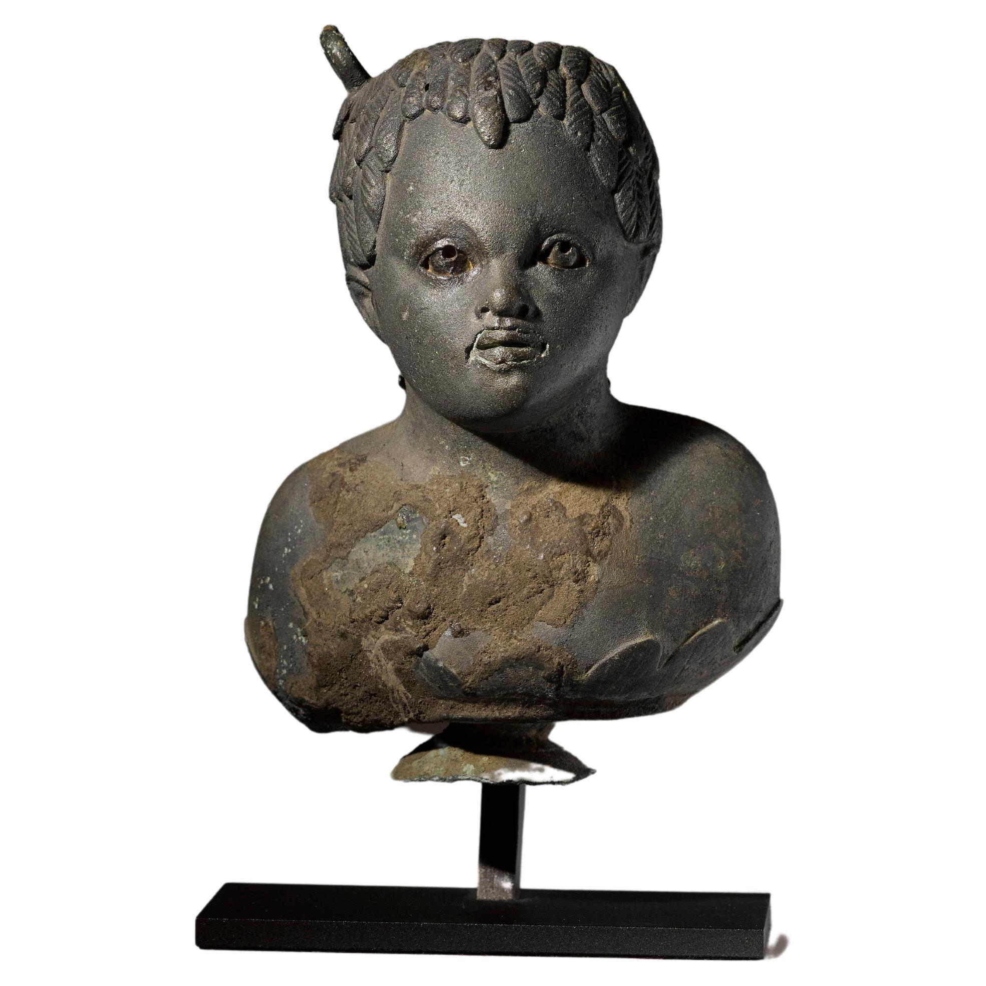 Balsamarium shaped as a Bust of a Black Boy - Roman, 1st – 2nd Century AD For Sale