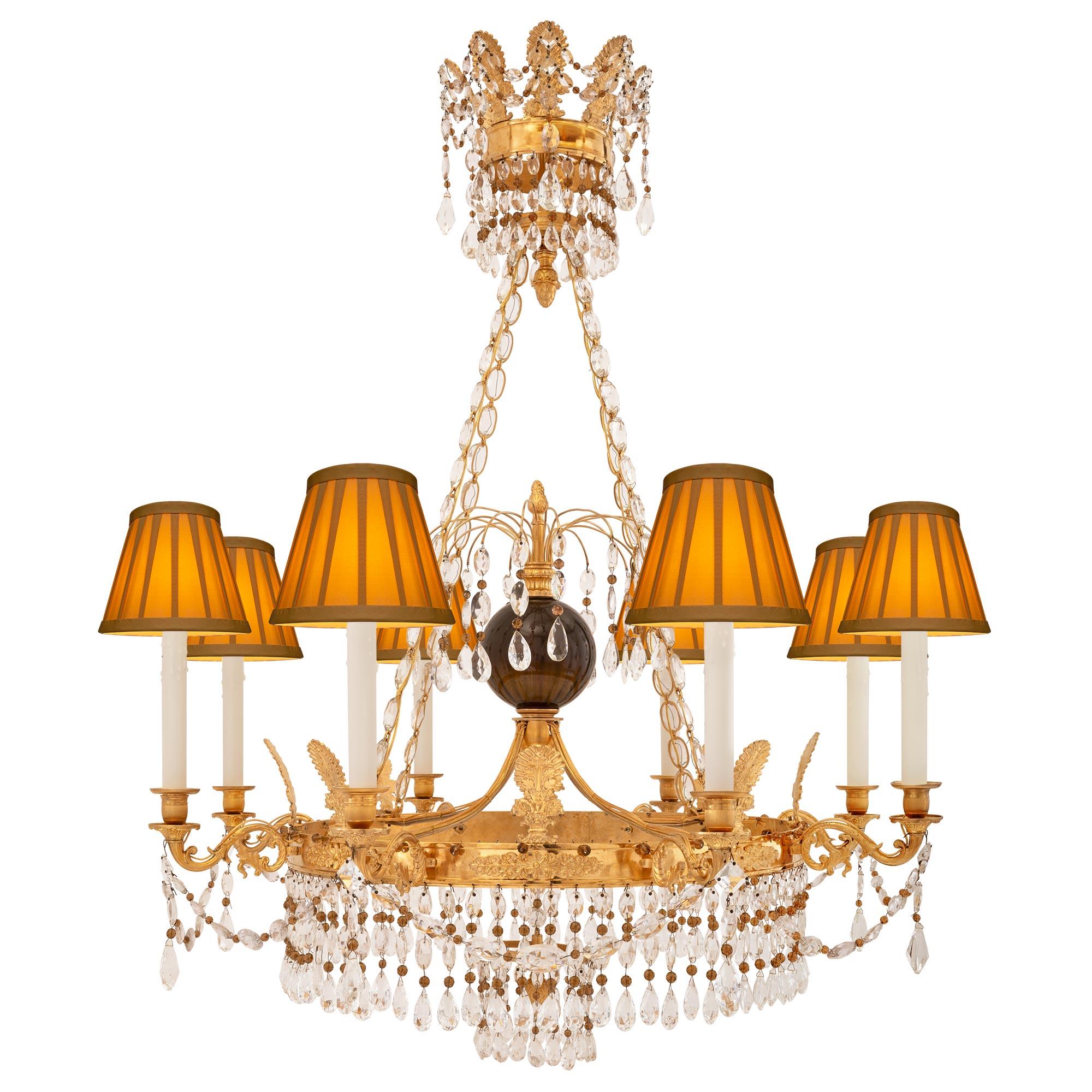 A stunning and extremely high-quality Baltic 19th century neo-classical st. ormolu, crystal, and smoked glass chandelier. The eight-light chandelier is centered by a charming bottom acorn finial surrounded by lovely beaded crystal garlands. The