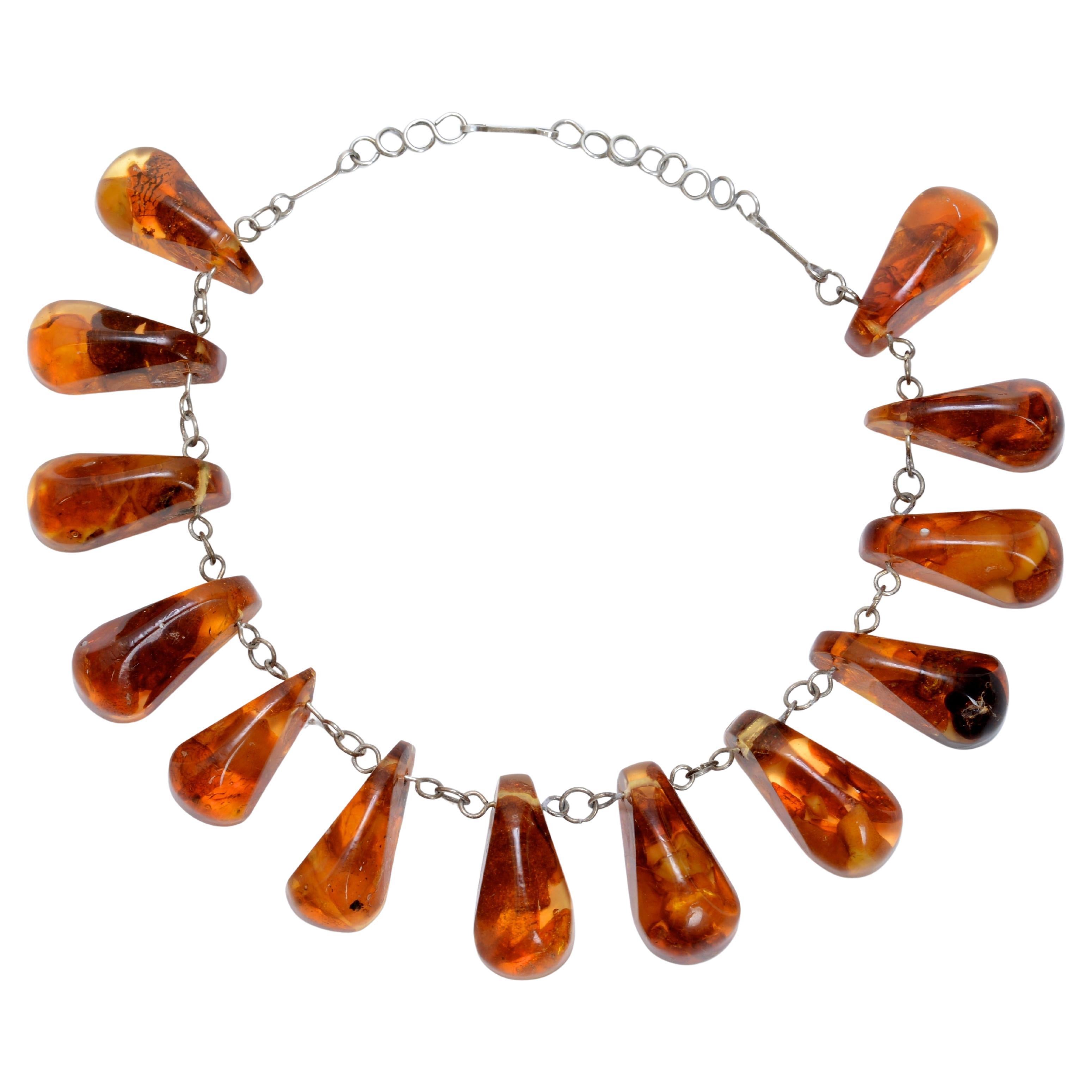 Baltic Amber Necklace Set With 13 Tear Drop Shaped Polished Amber 
Sterling For Sale