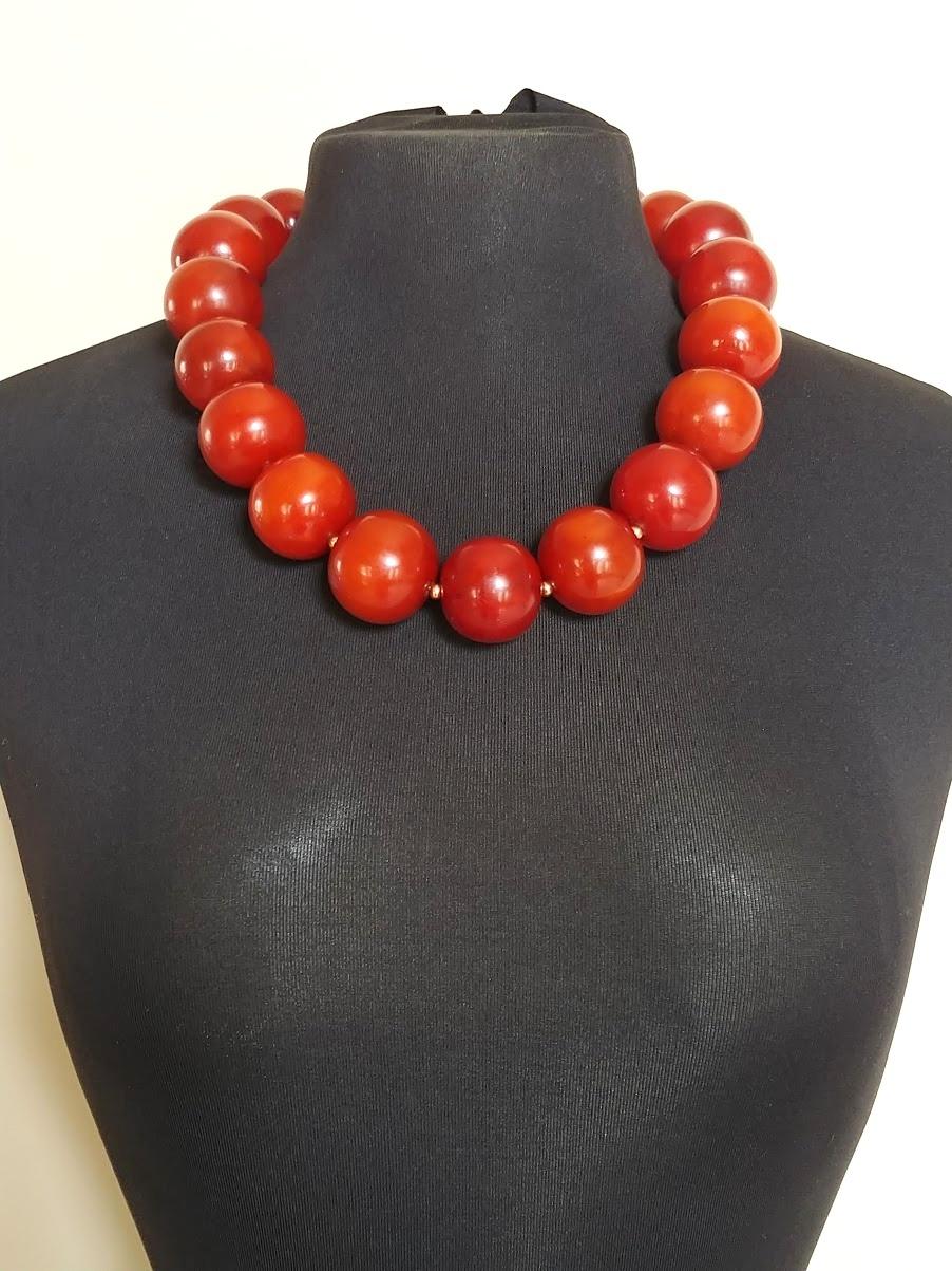 If you are looking for a chunky classic amber beaded necklace, this is perfect for you.
This necklace features a lovely strand of genuine Baltic pressed dark butterscotch amber beads.

Top quality 100% Natural Pressed Baltic Amber
Color: