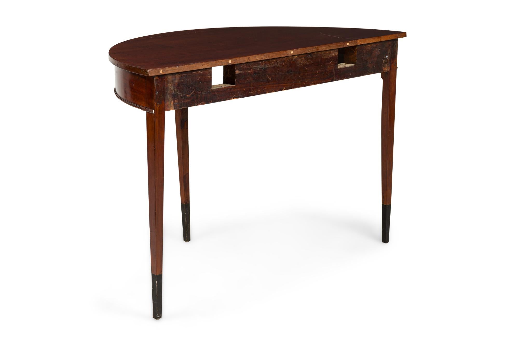 Ébénisé Baltic Pair Demi Lune Console Tables circa 1800 18000.00 en vente