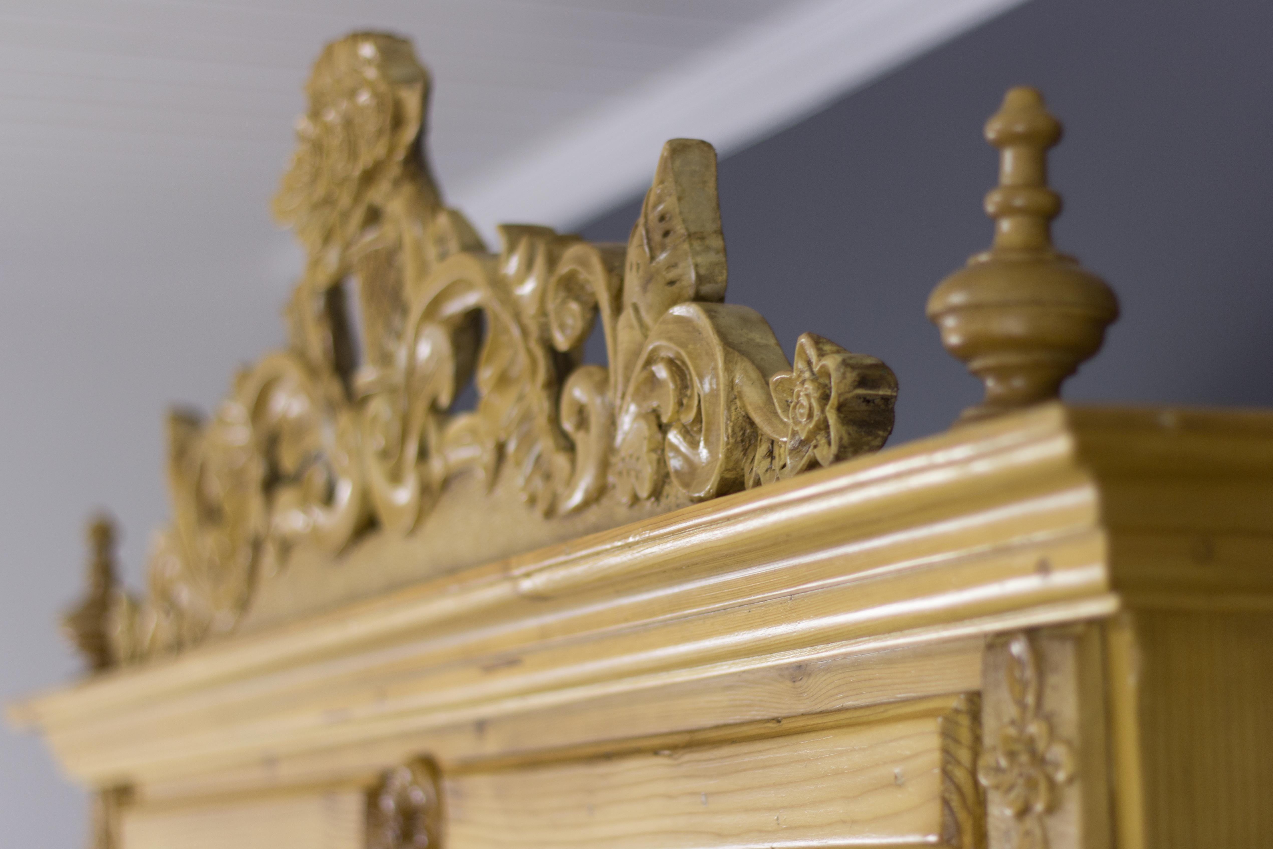 Baltic Pine Two-Door Armoire with Carved Flower Crown, 1920s 10