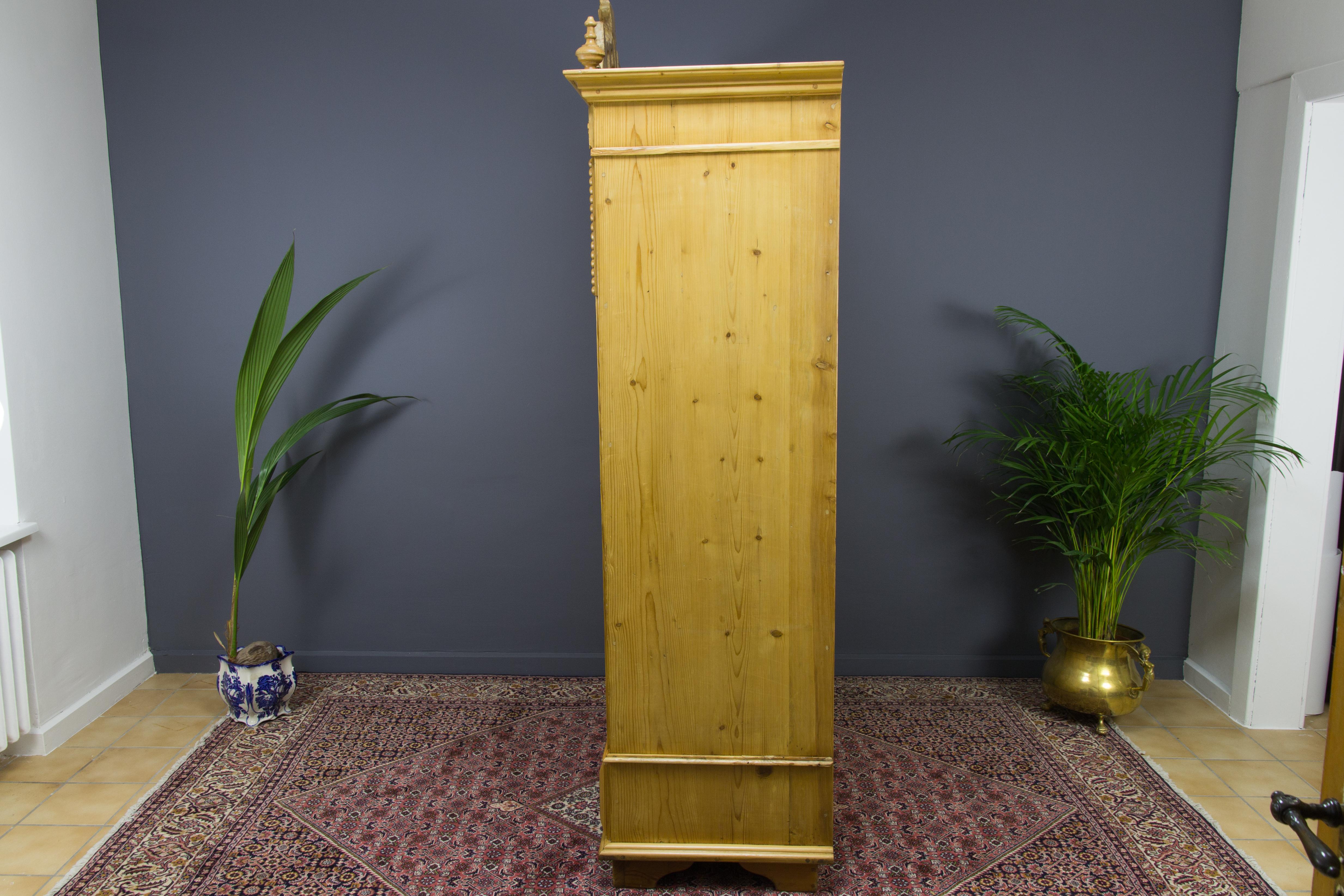 Metal Baltic Pine Two-Door Armoire with Carved Flower Crown, 1920s