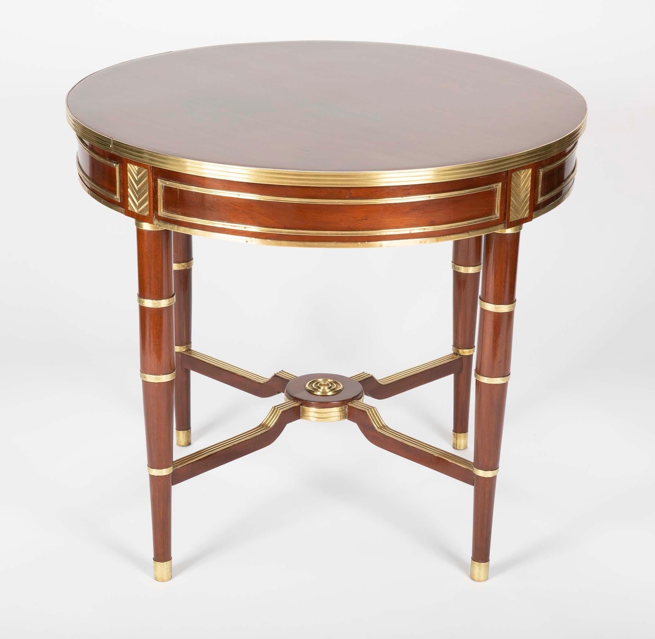 A neoclassical mahogany centre table with brass mountings, 19th century and later. Baltic possibly Russian.