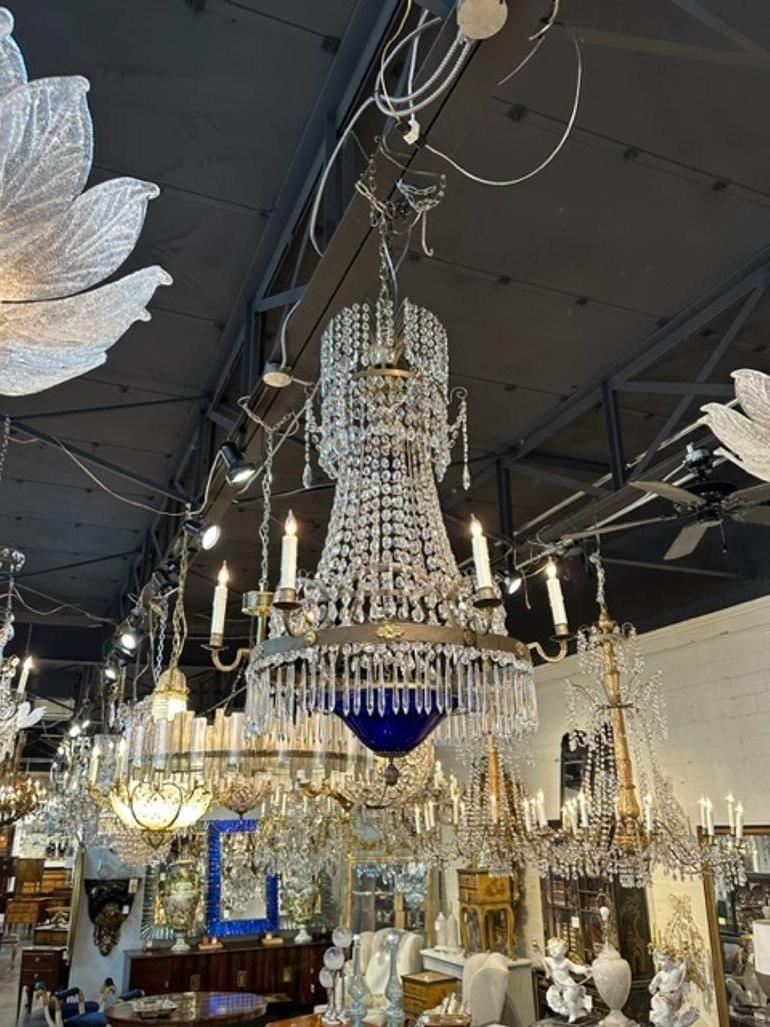 19th century Baltic state neo-classical bronze and crystal chandelier. Circa 1870. The chandelier has been professionally rewired, comes with matching chain and canopy. It is ready to hang!