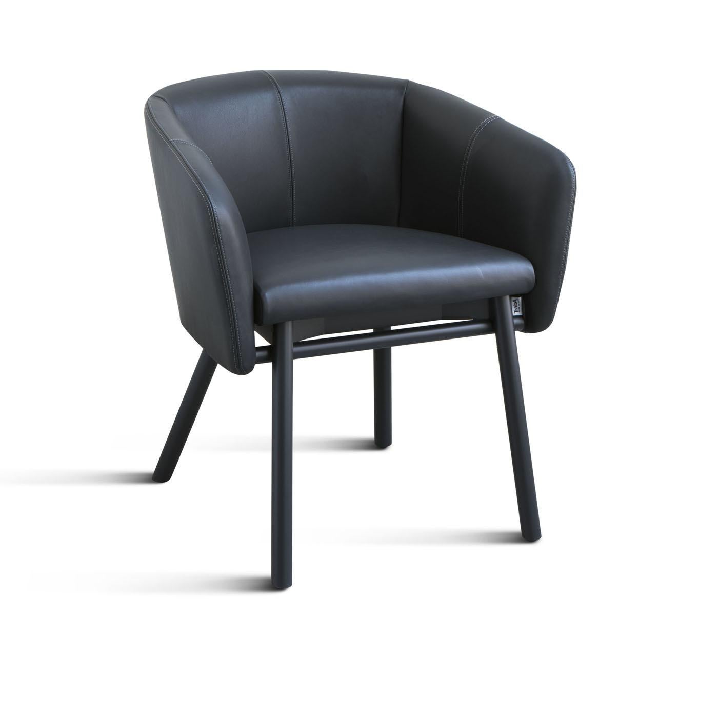 Simple and sophisticated, this chair is an exquisite piece of functional decor, taking inspiration from the traditional tub chair with a welcoming silhouette. Its gorgeous design features a black-polished beechwood with slanted legs, and a leather