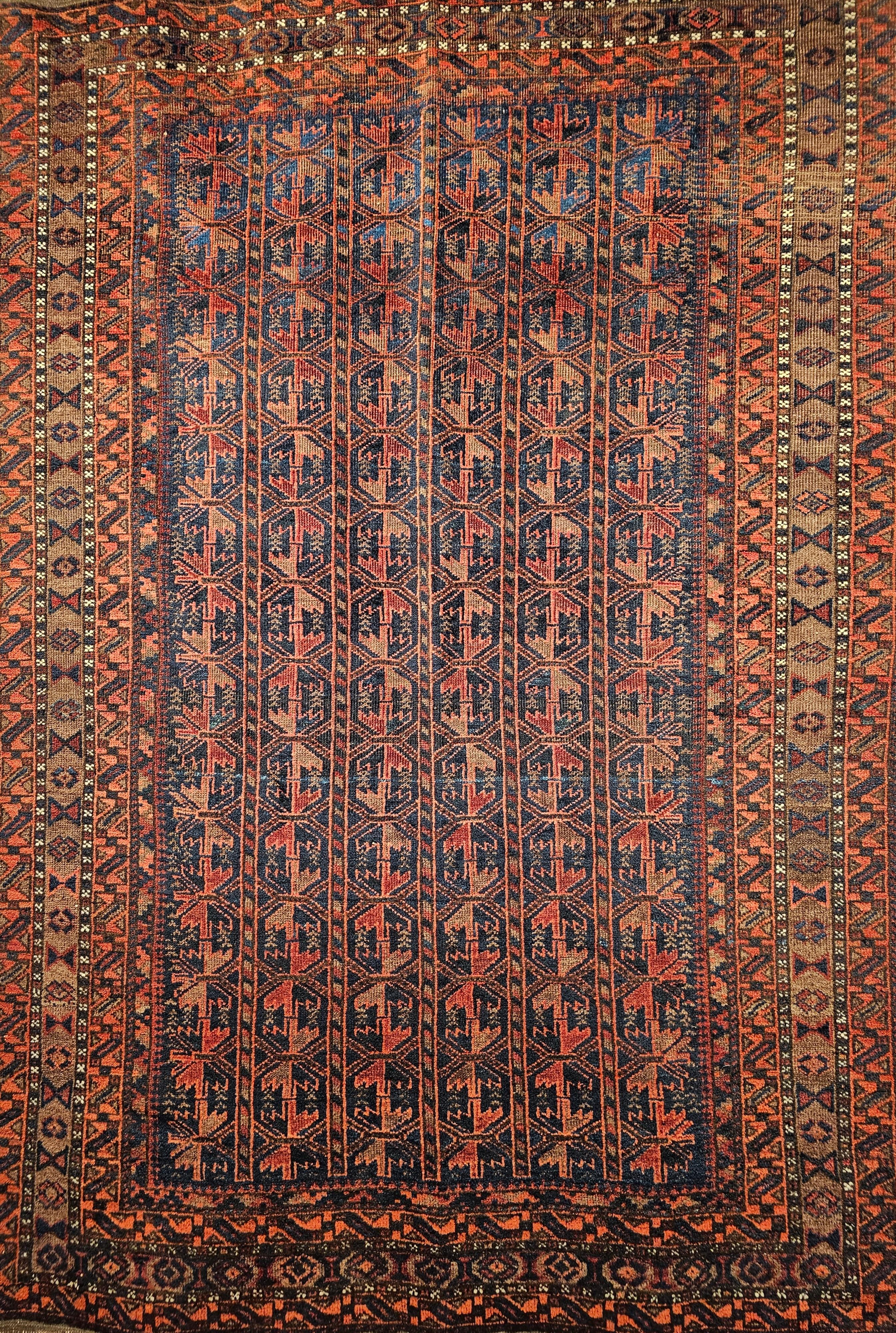 Afghan Vintage Baluch Tribal Area Rug in Allover Geometric Pattern in Navy Blue, Brown For Sale