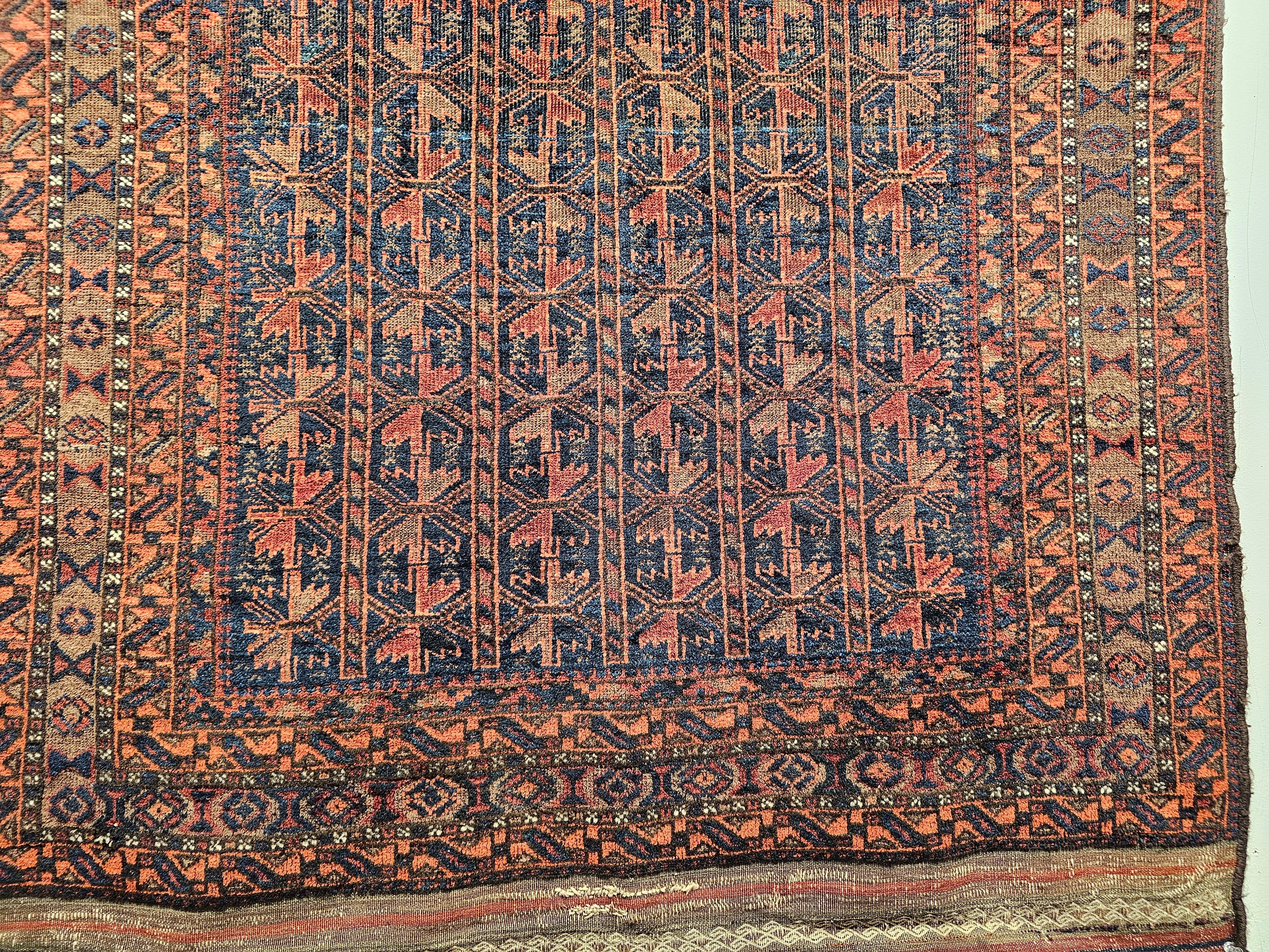 Vegetable Dyed Vintage Baluch Tribal Area Rug in Allover Geometric Pattern in Navy Blue, Brown For Sale