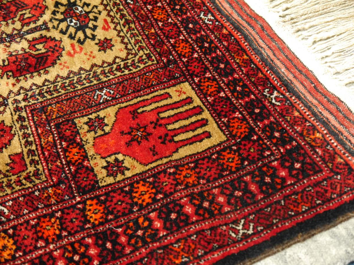 Vintage tribal rug in prayer design.

Baluch or Balouch people are settling in villages in Afghanistan and Pakistan near the Persian border. Their origin is tribal nomadic, but most members of the tribes have settled in villages in the last decades.