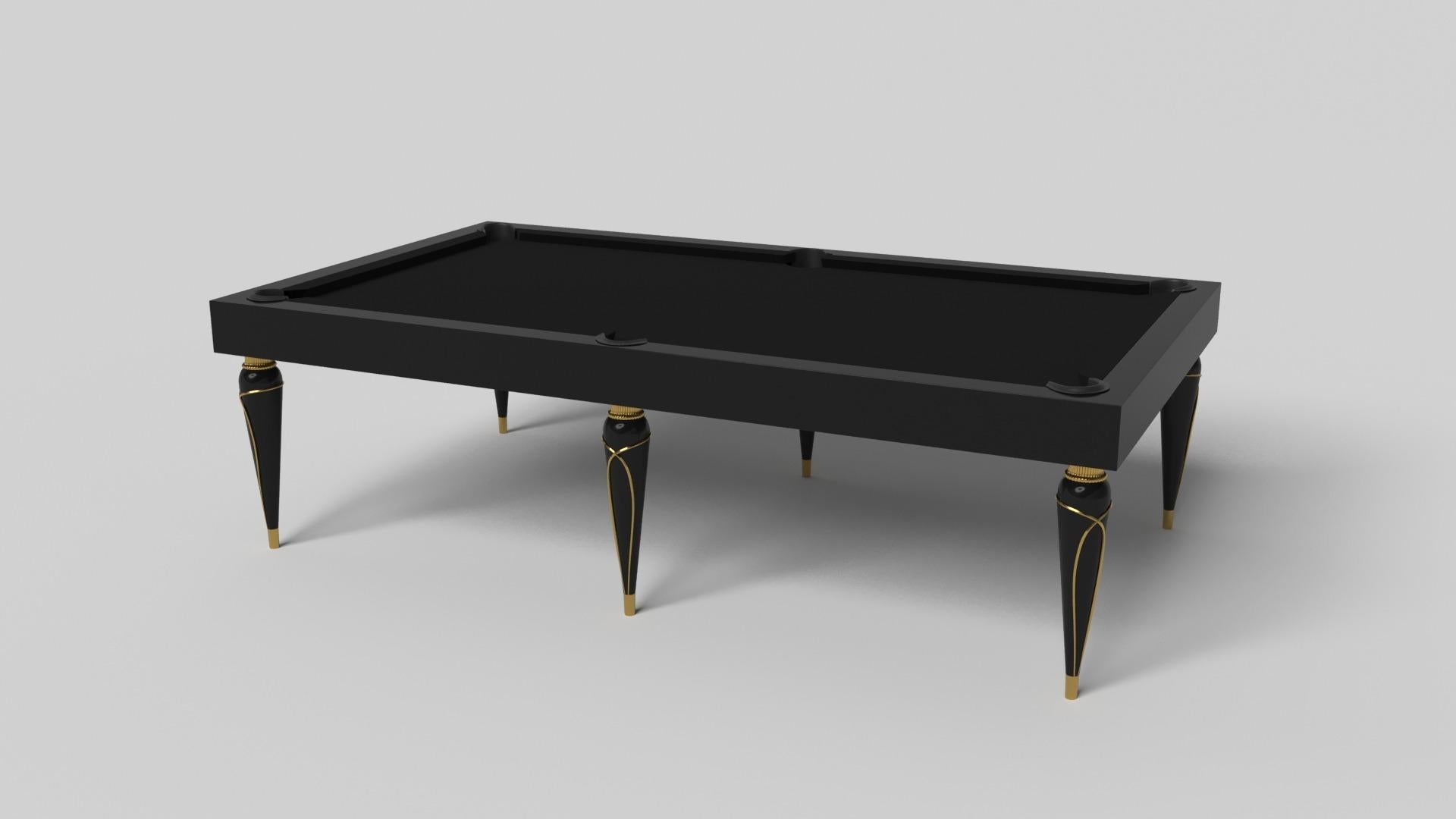 Champagne gold accents add undeniable elegance to this luxury pool table. Offering superior playability and uncompromised style, this design features hand carved details, decorative metal elements, and metal sabots at the bottom of each leg. The