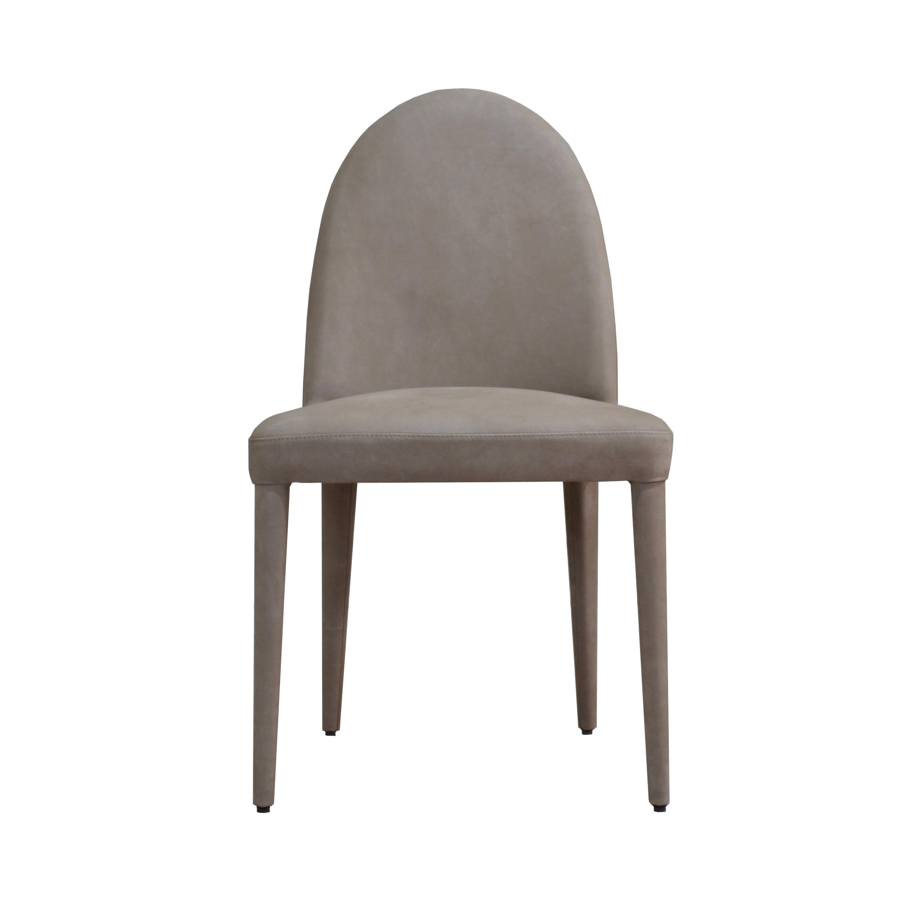 Timeless charm and simple elegance set this chair apart. Entirely upholstered, this design is a perfect balance of modern materials and Classic shapes, featuring slender legs, rounded backrest, and a spacious square seat. Versatile and comfortable,