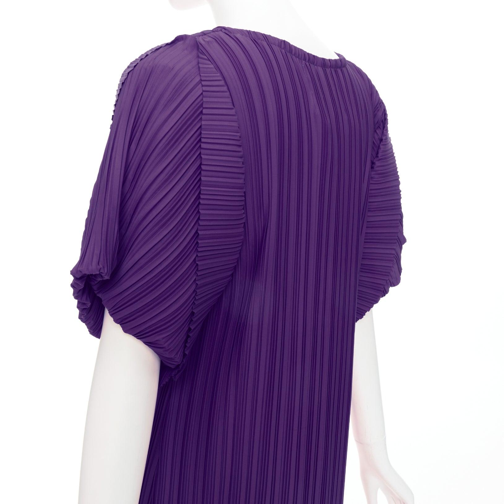 BAMBAH Beach purple plisse puff half sleeve crew neck midi dress
Reference: KNLM/A00383
Brand: Bambah
Material: Polyester
Color: Purple
Pattern: Solid
Closure: Slip On
Made in: Dubai

CONDITION:
Condition: Unworn in mint condition, with tags. 
Comes