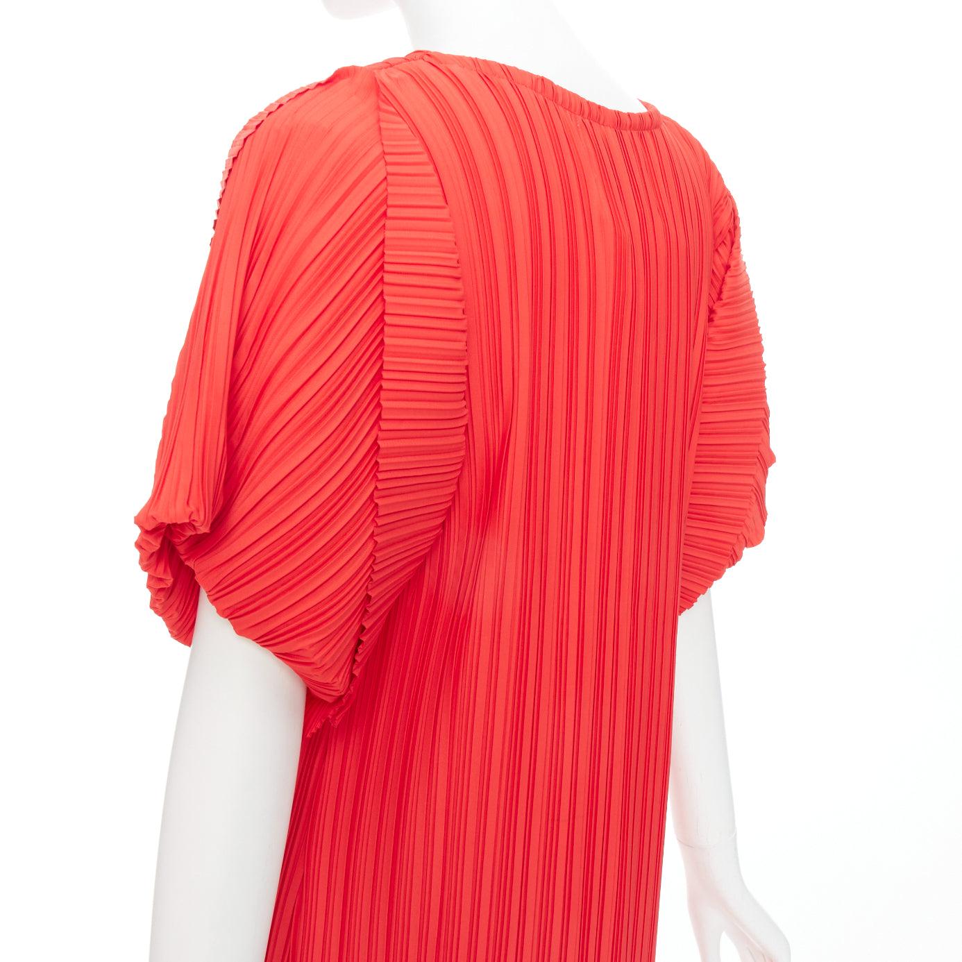 BAMBAH Beach red plisse puff half sleeve crew neck midi dress
Reference: KNLM/A00382
Brand: Bambah
Material: Polyester
Color: Red
Pattern: Solid
Closure: Slip On
Made in: Dubai

CONDITION:
Condition: Unworn in mint condition, with tags. 
Comes with: