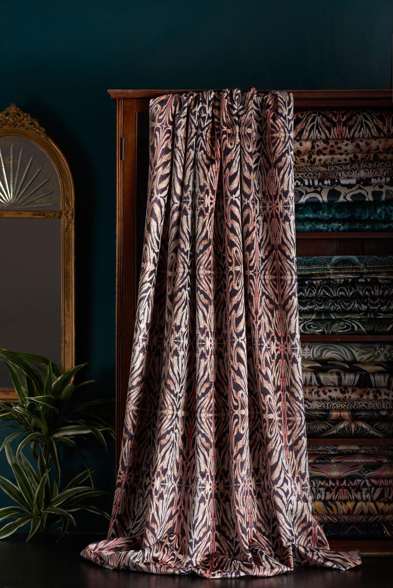 BamBam is a vivid animalesque design hand painted by Anna. Warm pinks, soft black and cream tones mingle to form a tribal, detailed design with a cosy luxurious vibe.

This velvet is thick and luxurious, with a strong straight woven backing. It is