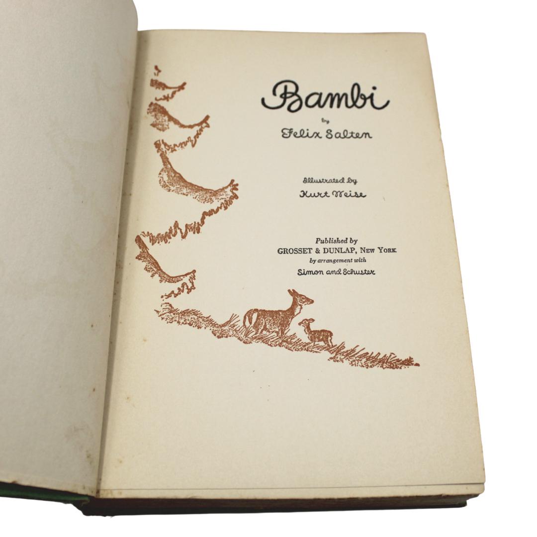 Salten, Felix. Bambi: A Life in the Woods. New York: Grosset & Dunlay, 1931. Translated by Whitaker Chambers. Illustrated by Kurt Wiese. In original green hardcover boards with embossed titles and a deer illustration on the cover, embossed titles to