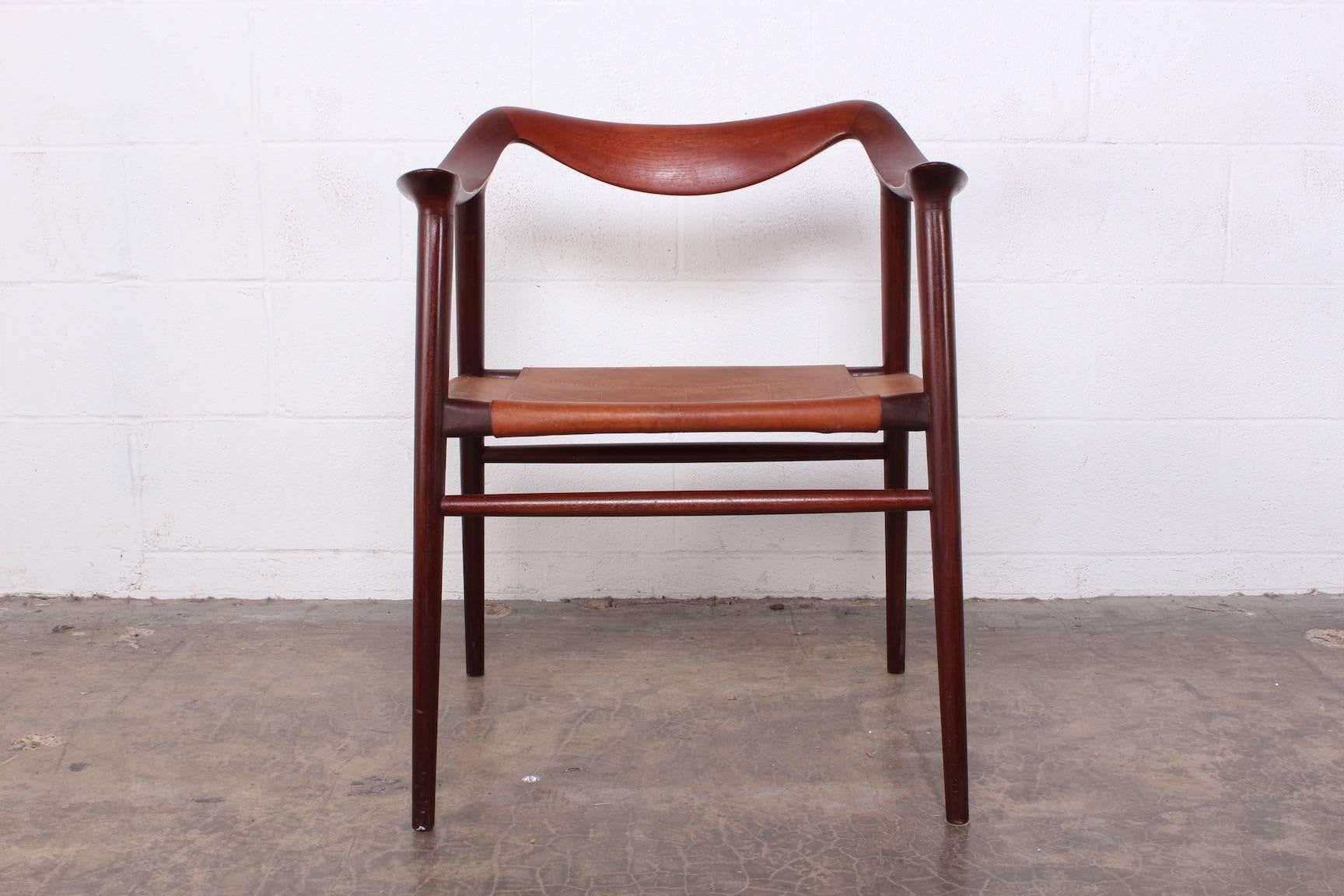 Teak Bambi armchair by Radstad and Relling with original leather seat.