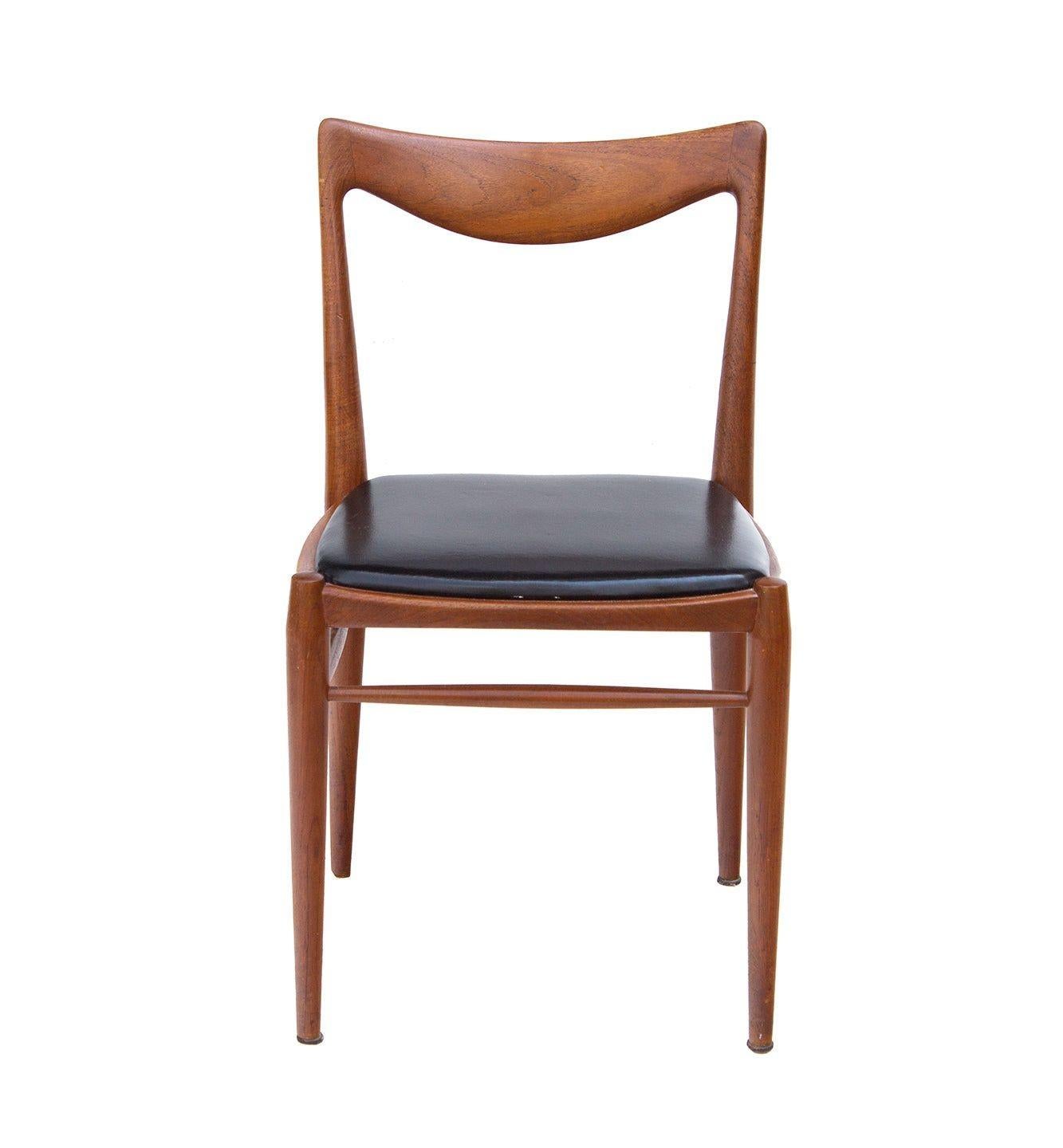 Norway, 1960s

Bambi Teak Dining Chair by Rolf Rastad & Adolf Relling for Gustav Bahus, Norway. 

CONDITION NOTES: One stretcher has broken off. Joints have been glued and braced. Full service recommended. 

DIMENSIONS: 18