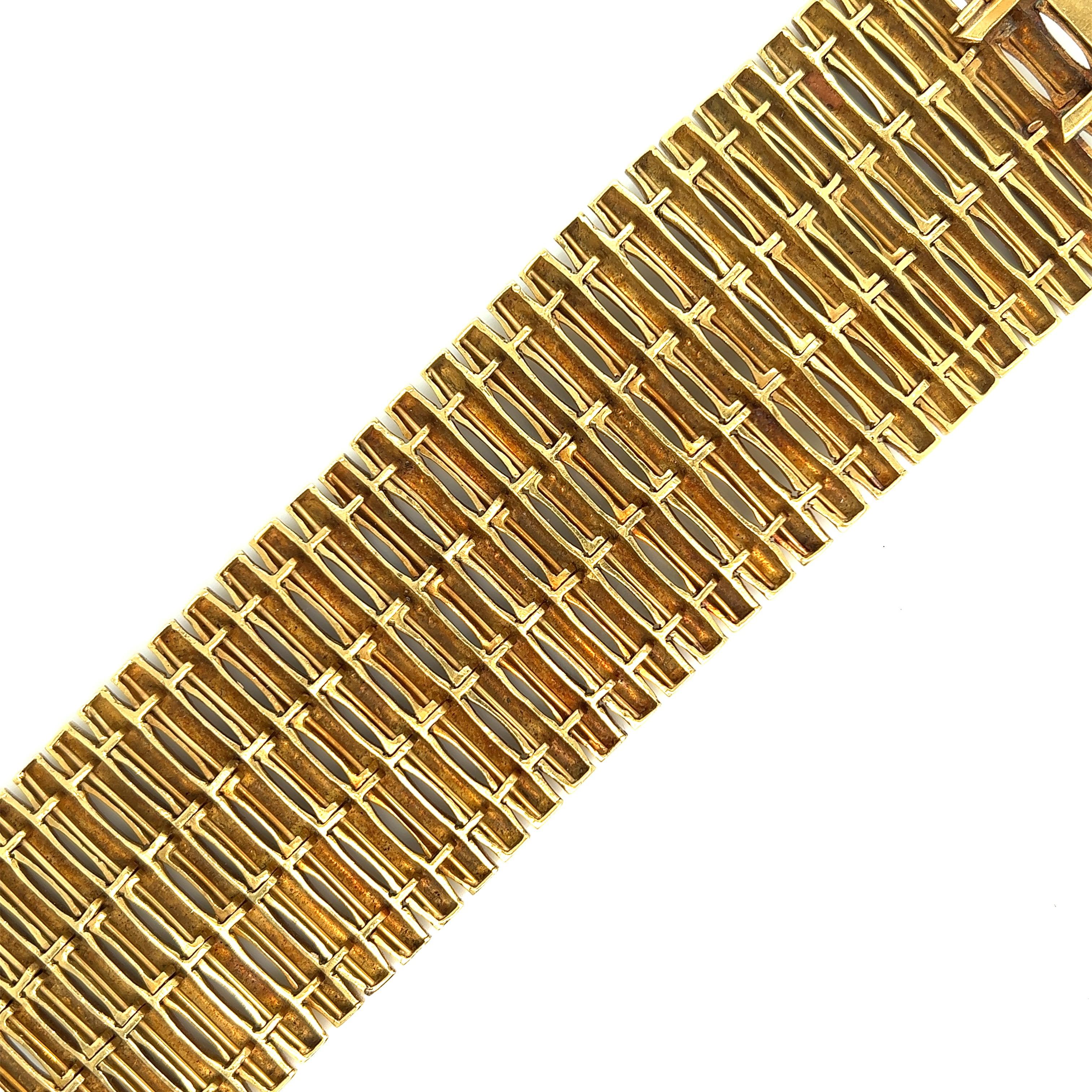 Bamboo yellow gold bracelet 

18 karat yellow gold bracelet with bamboo motif; marked 18kt

Size: width 1.75 inches, length 6.75 inches
Total weight: 154.1 grams