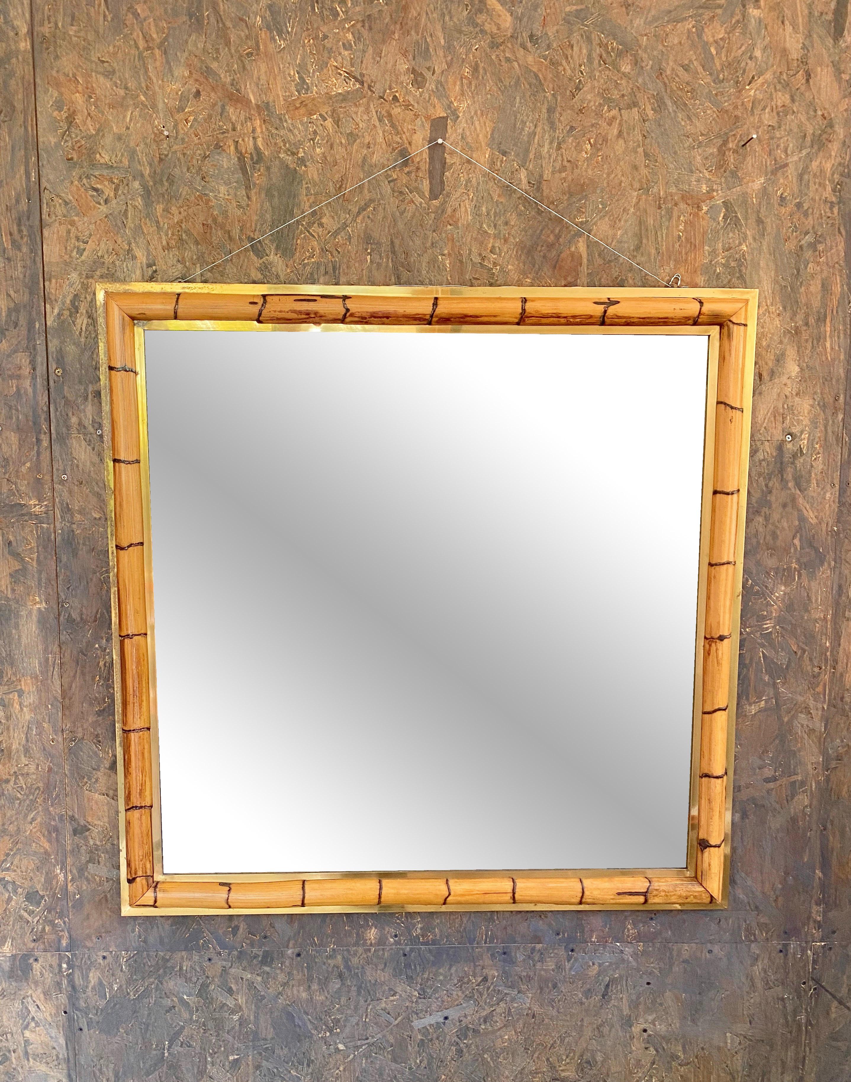 Squared wall mirror in a bamboo and brass frame in the style of the Italian designer, 1970s.