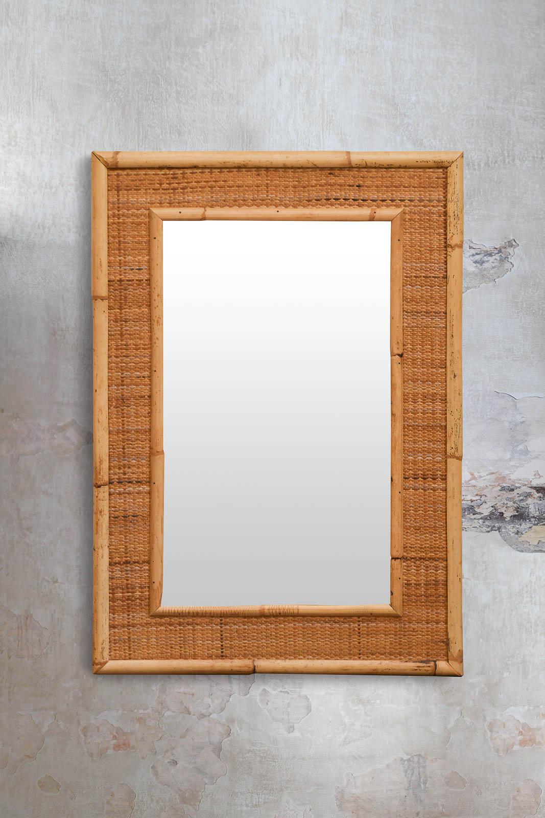 Miroir en bambou et rotin, production Dal Vera, années 1970
Détails du produit
Dimensions : 58 L x 83 H x 3 D cm