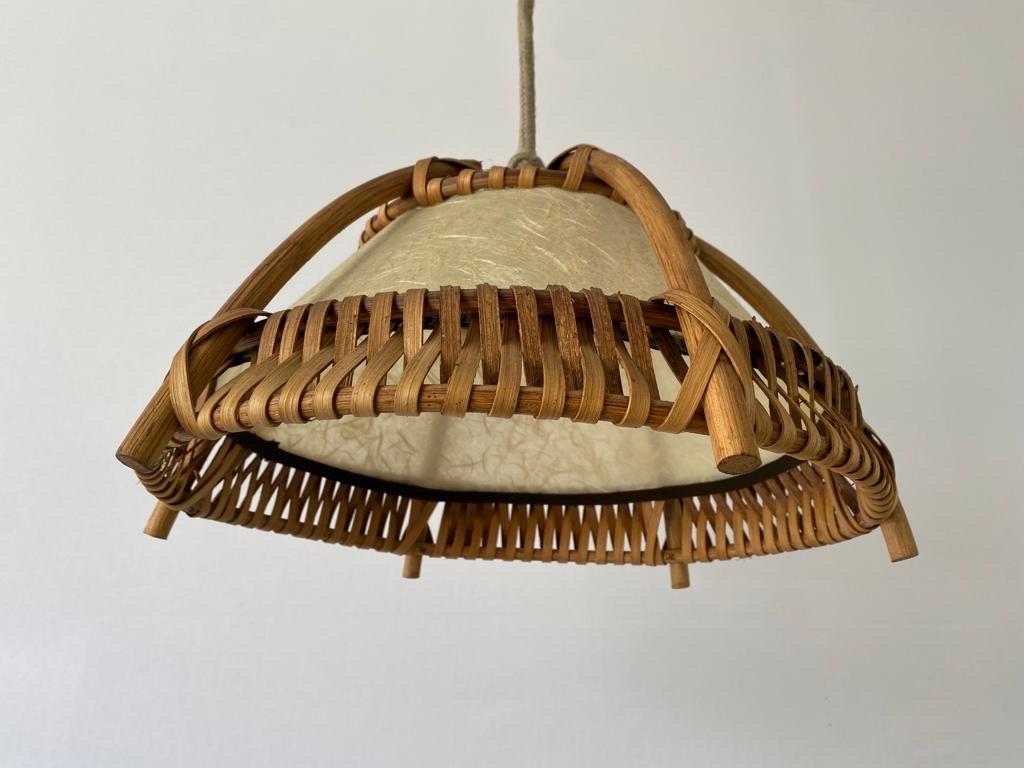 Bamboo and Cocoon Pendant Lamp, 1960s, Germany
 
Minimal and natural design
Very high quality.
Fully functional.

Lamps are in very good vintage condition.
Wear consistent with age and use

This lamp works with one E27 standard light bulb. Max