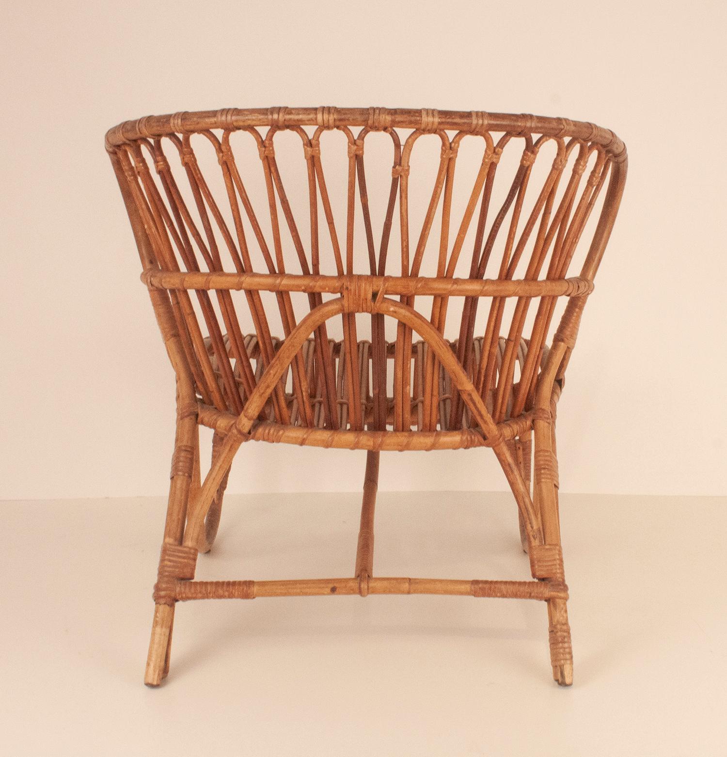 Bamboo and rattan armchair in the style of Viggo Boesen, Netherlands 50's
Very comfortable.