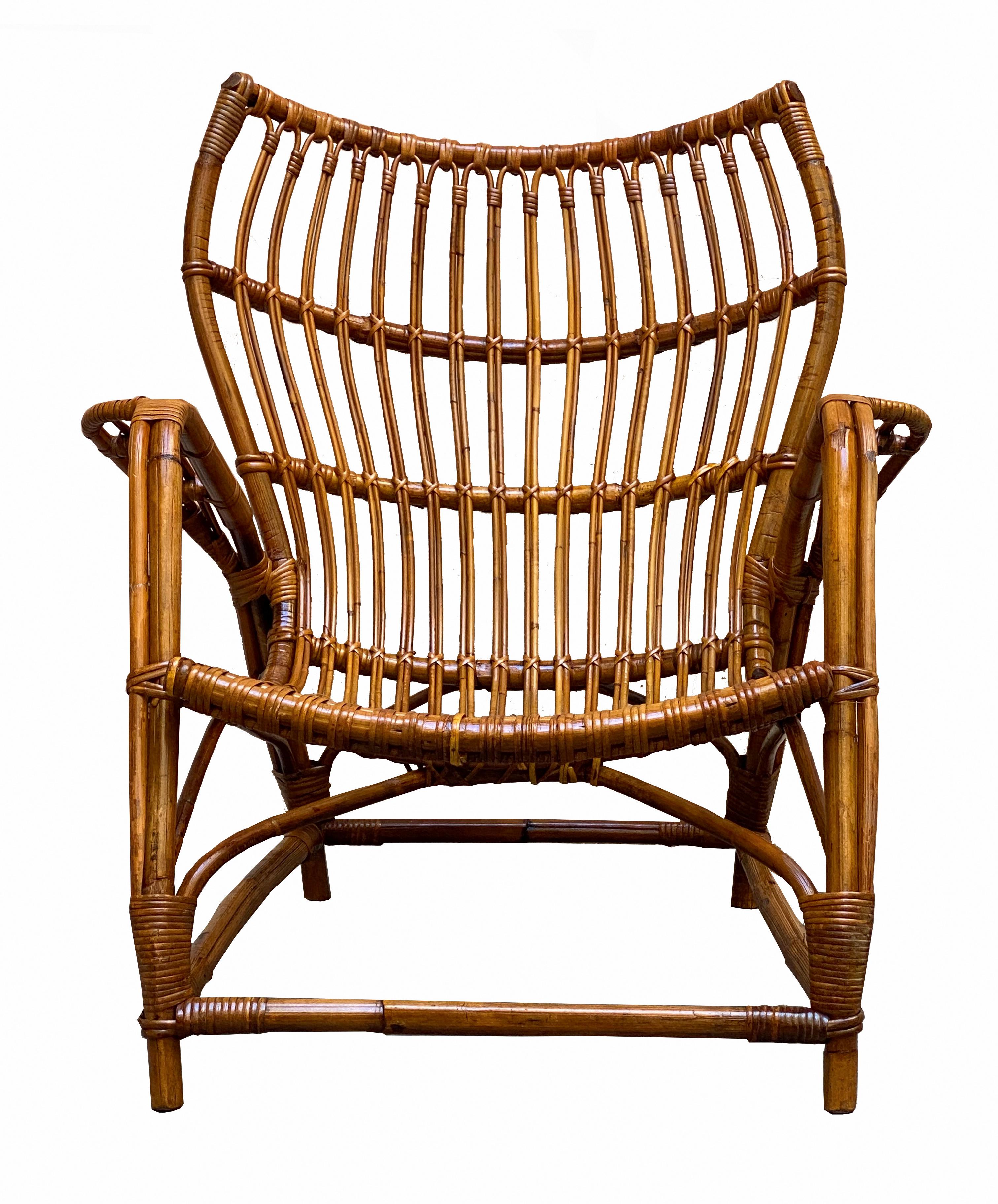 Italian-made armchair produced in the 1960s. Bent bamboo and woven rattan frame. Good overall condition, some marks due to normal use over time.