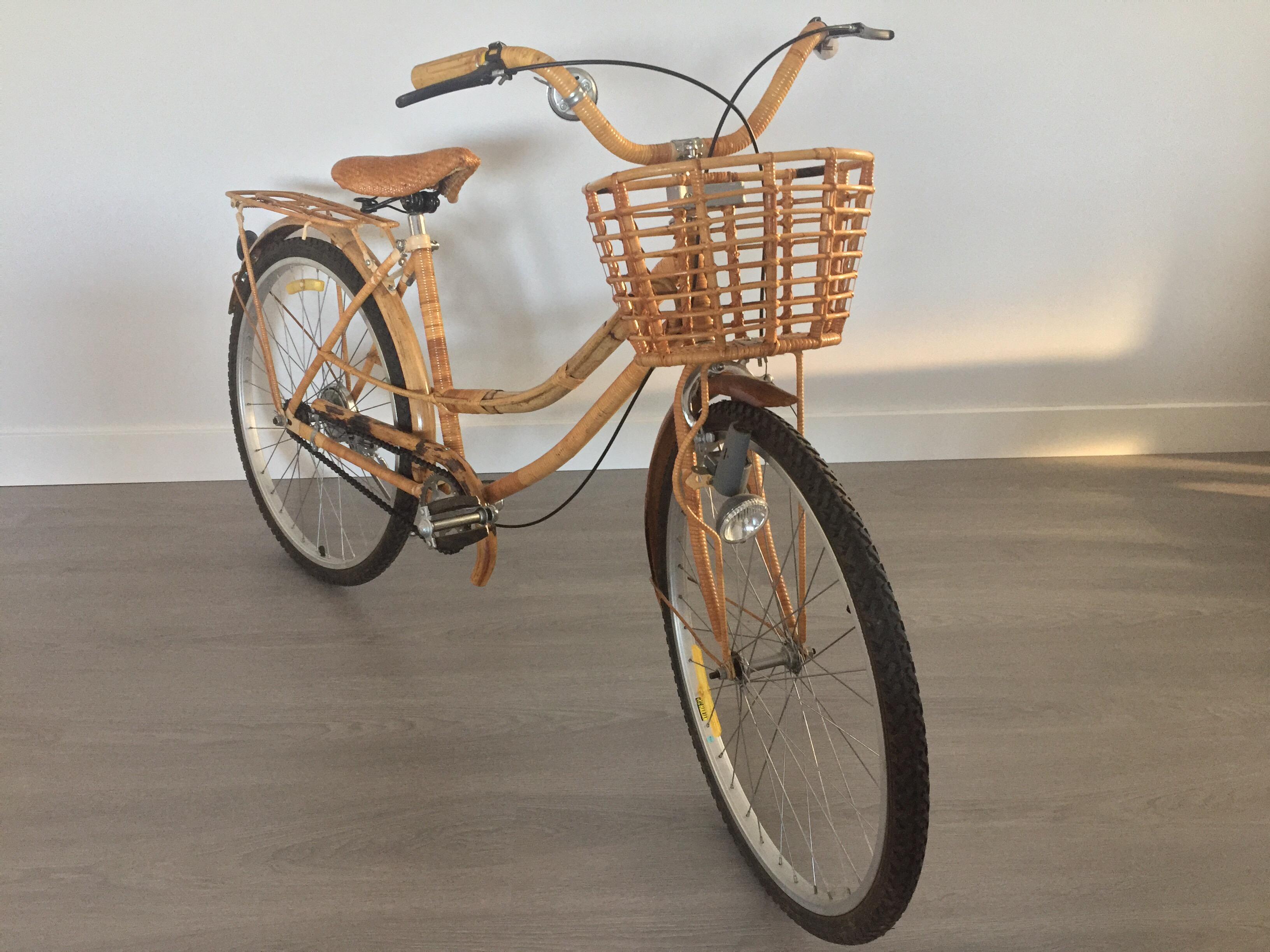 Fabulous vintage bamboo and rattan bike from in great vintage condition.
Includes attached basket, luggage rack and working front light.
Rides very smoothly with single gear.