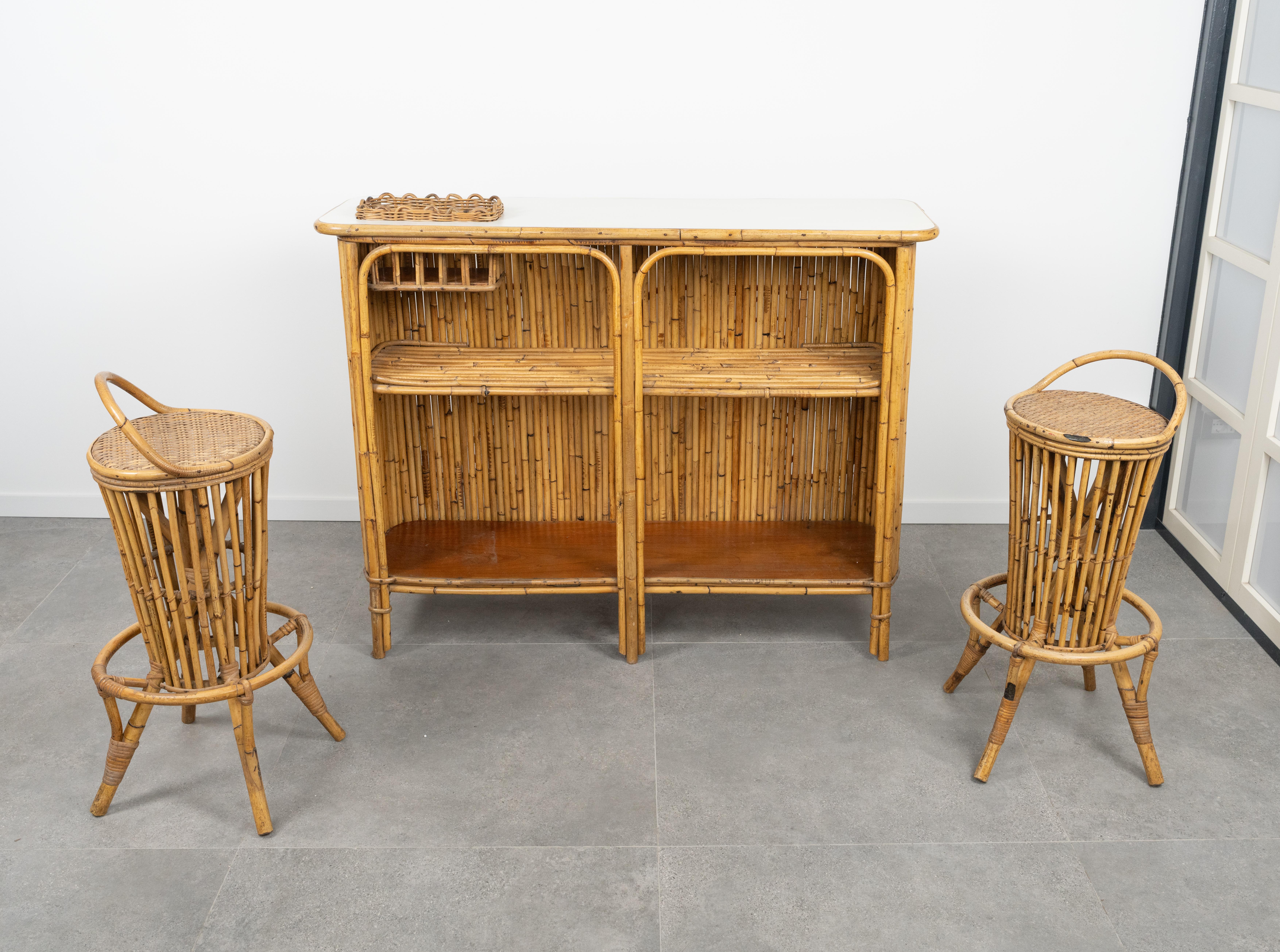 Italian Bamboo and Rattan Cabinet Bar with Two Stools by Tito Agnoli, Italy 1950s For Sale