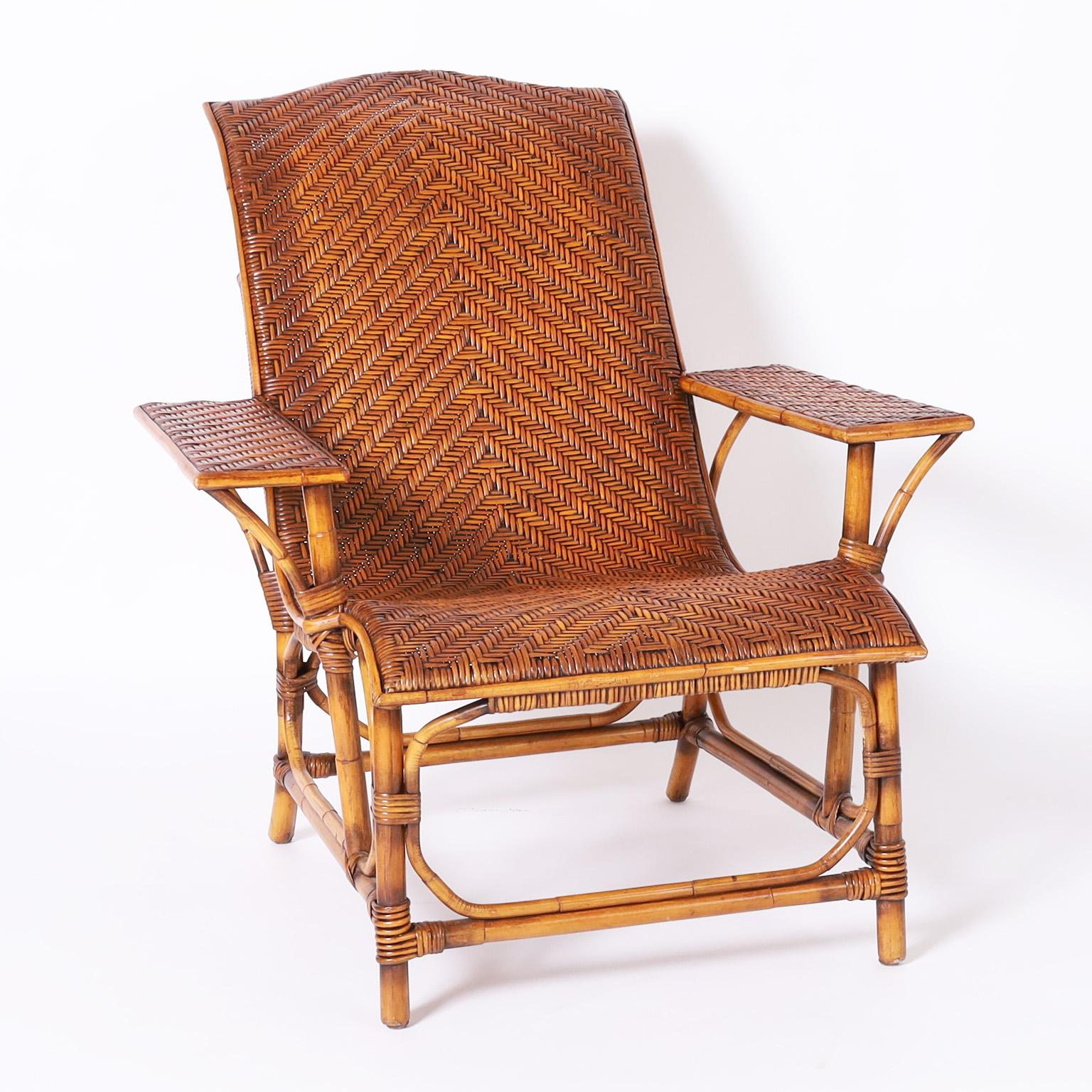 British Colonial Bamboo and Rattan Chair and Ottoman For Sale