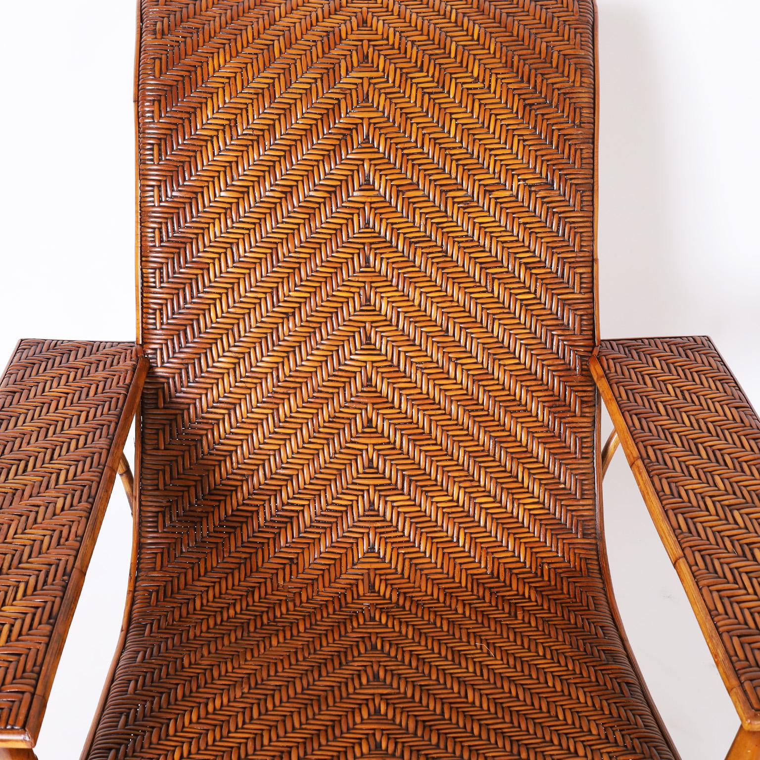 Hand-Woven Bamboo and Rattan Chair and Ottoman For Sale