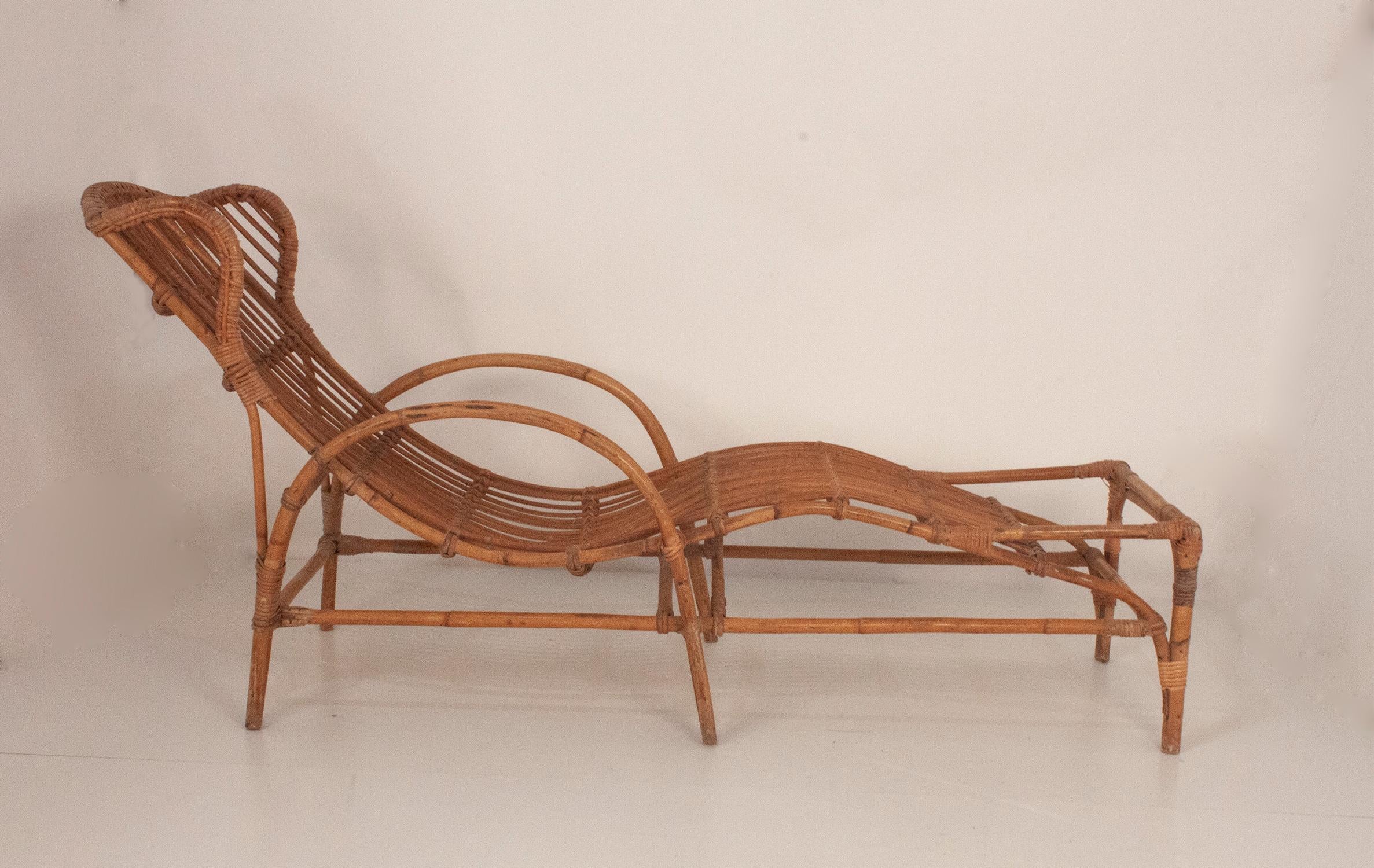 Bamboo and rattan chaise lounge midcentury. Spain.
 
   