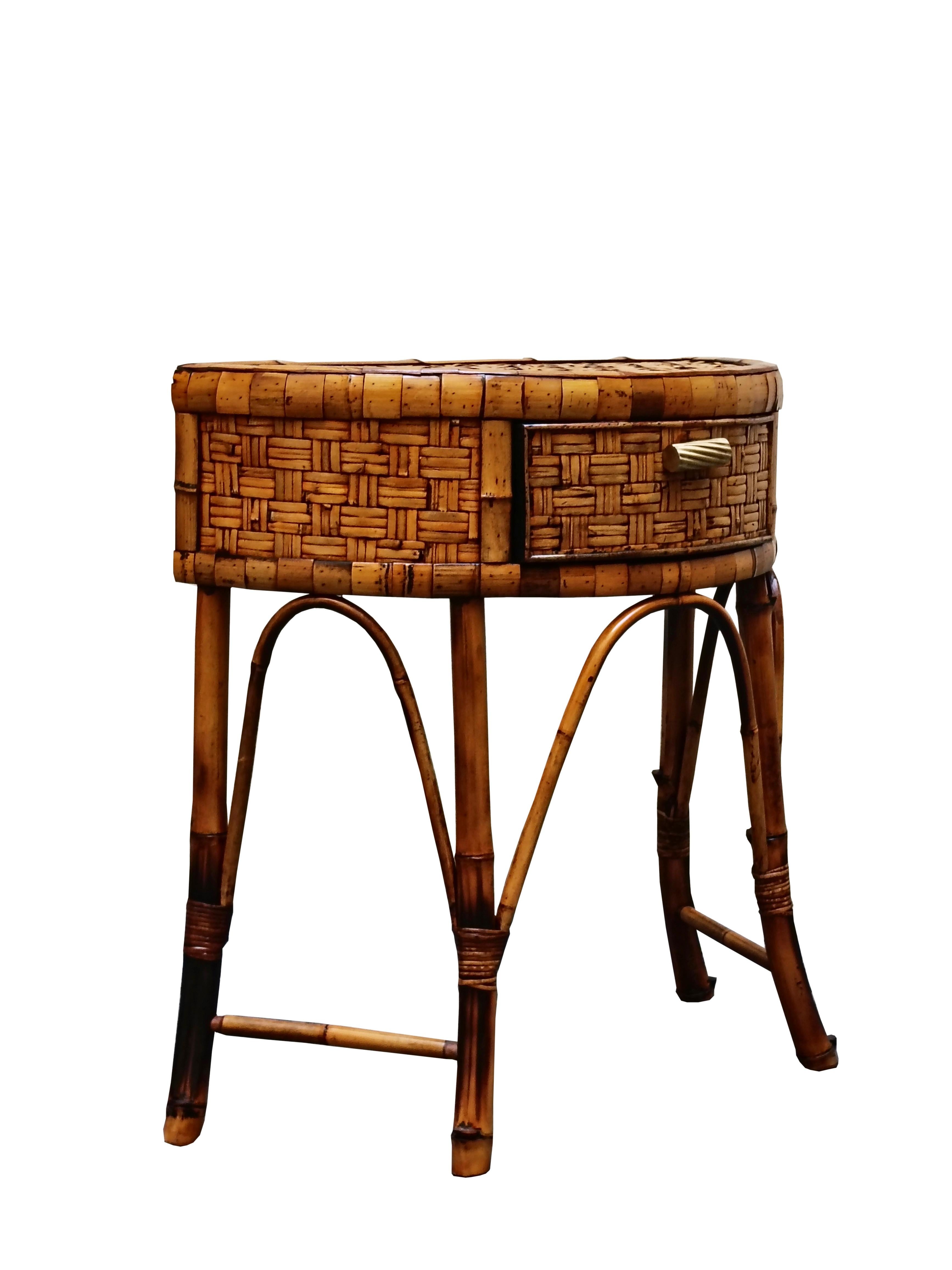 Small semi-circular console table with rattan frame on a four-leg double rush structure. Front drawer with brass torcion handle.  In the style of Franco Albini, Bonacina, Crespi and Vivai del Sud. .
