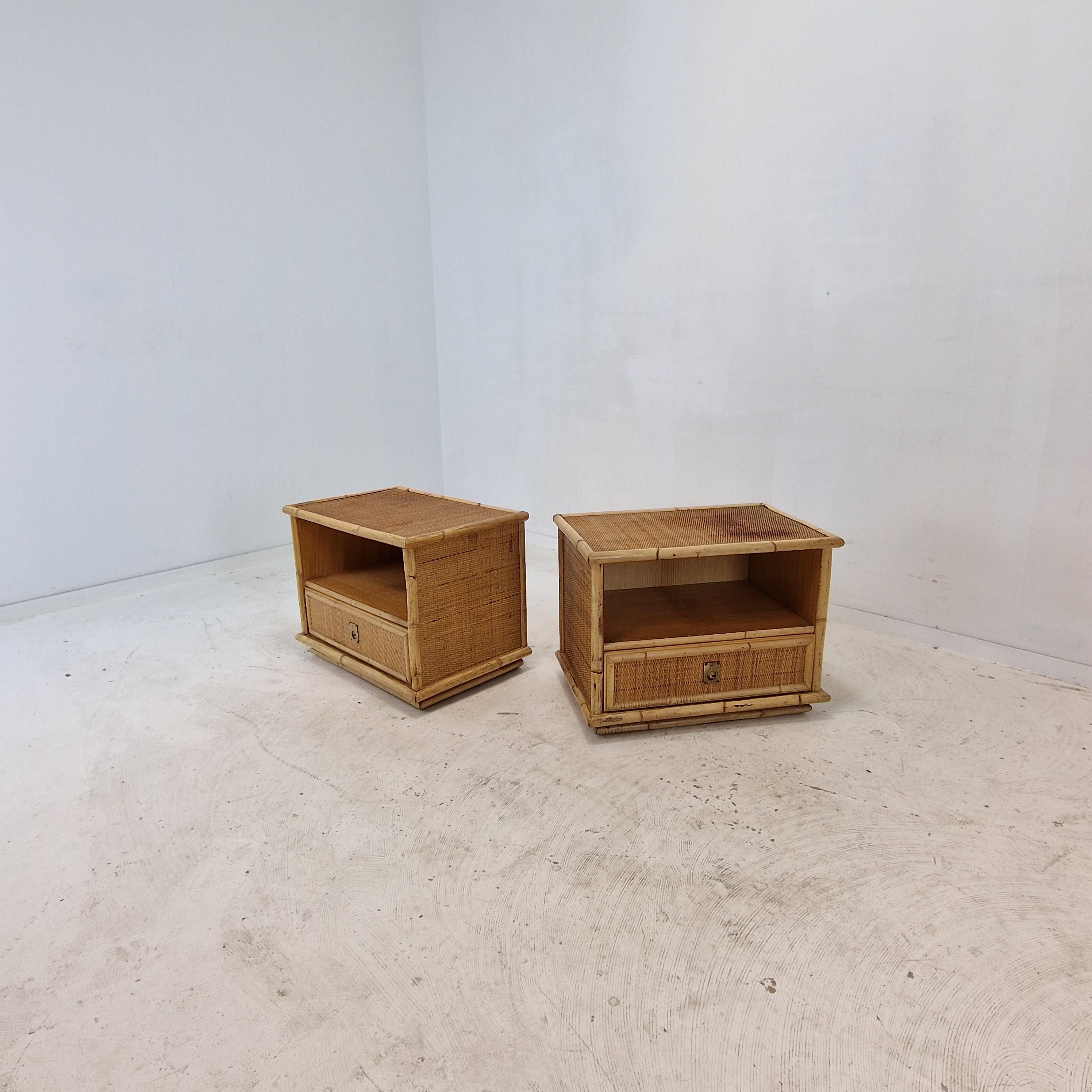 Beautiful pair of bedside tables / nightstands.
Made by the Italian manufacturer Dal Vera in the 70's. 

This lovely set is made of bamboo and rattan.
The brass handles are strong, adding eye-catching touches.
The organic beauty of the woven