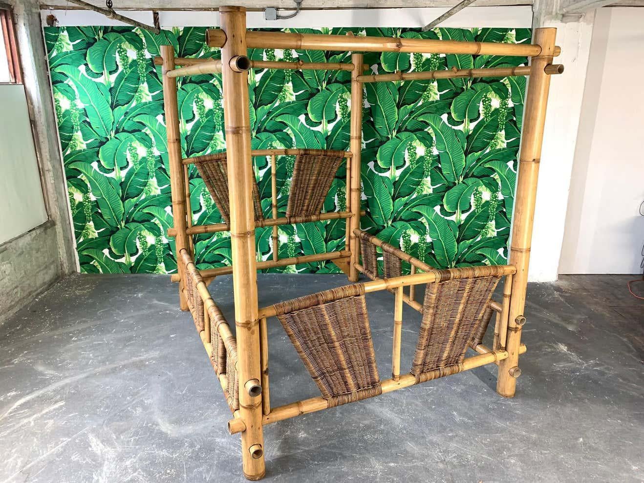 Queen size canopy bed constructed from oversized bamboo. Rattan detailing woven throughout. Very good vintage condition with only minor signs of age appropriate wear.
Measures: Total width 76