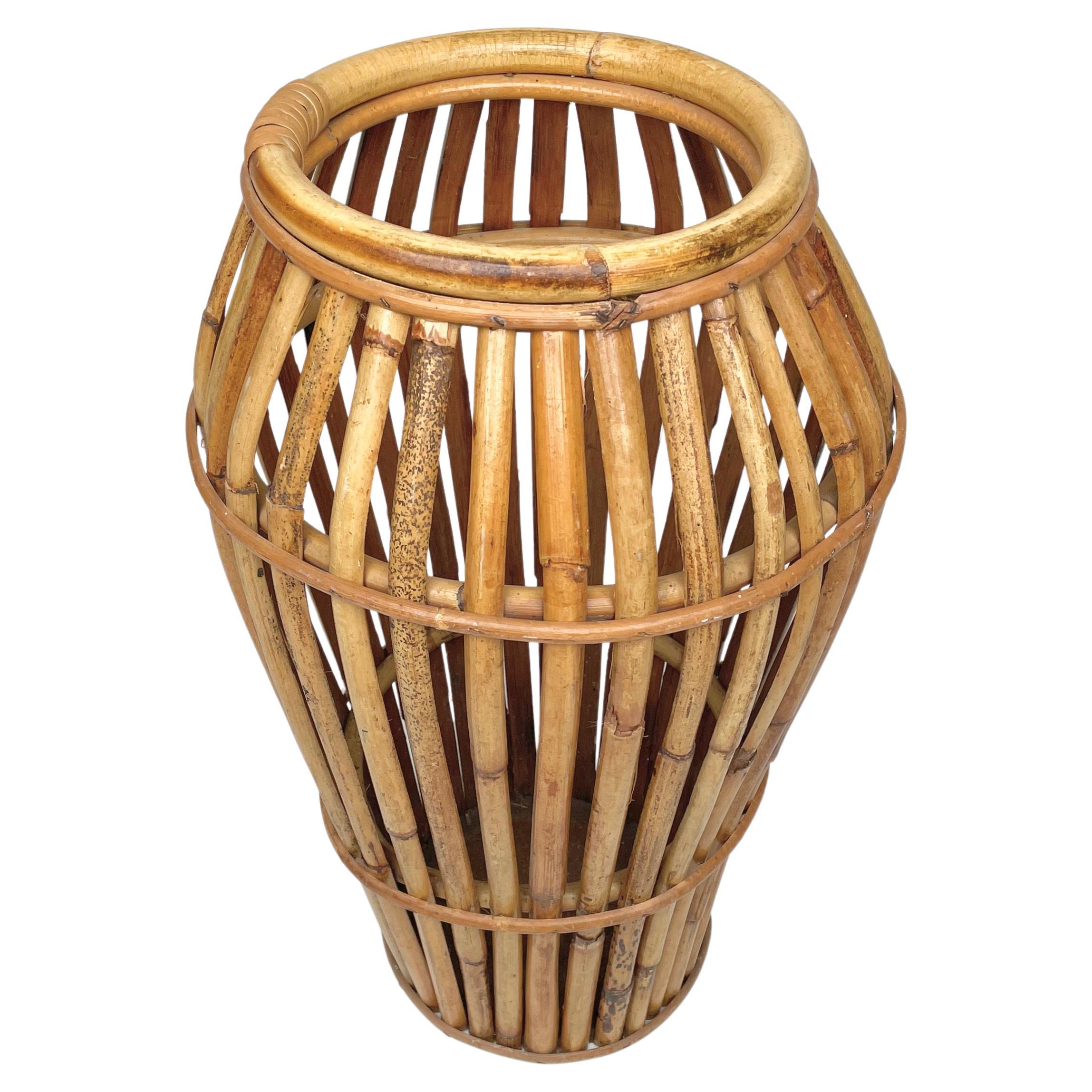 Umbrella stand in rattan and bamboo made in Italy in the 1960s.