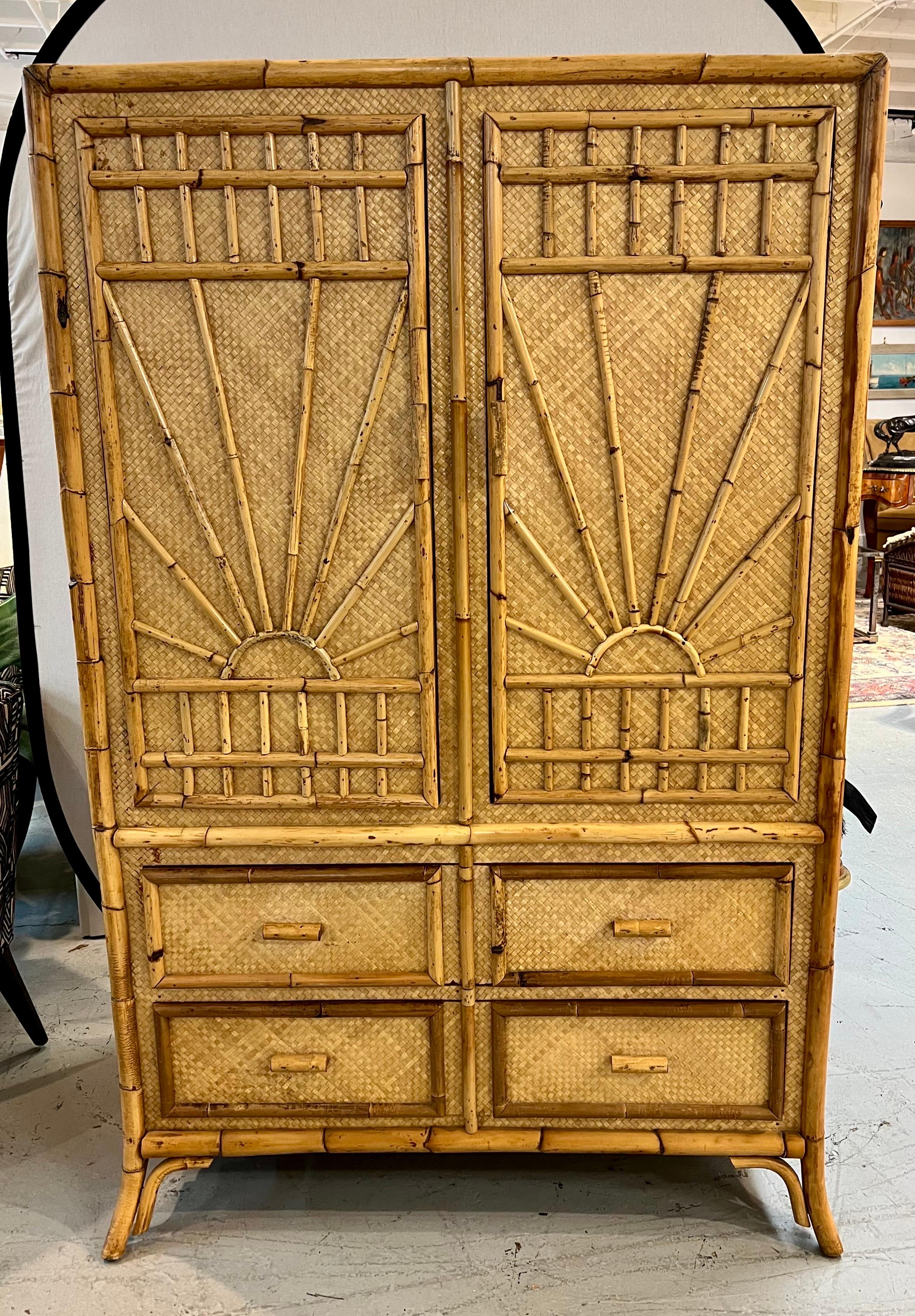 Vintage chinoiserie bamboo and rattan wardrobe or armoire with multiple shelves and compartments. Stellar craftsmanship throughout. Rare to find a bamboo and rattan piece with this scale.  Why not own the best?
