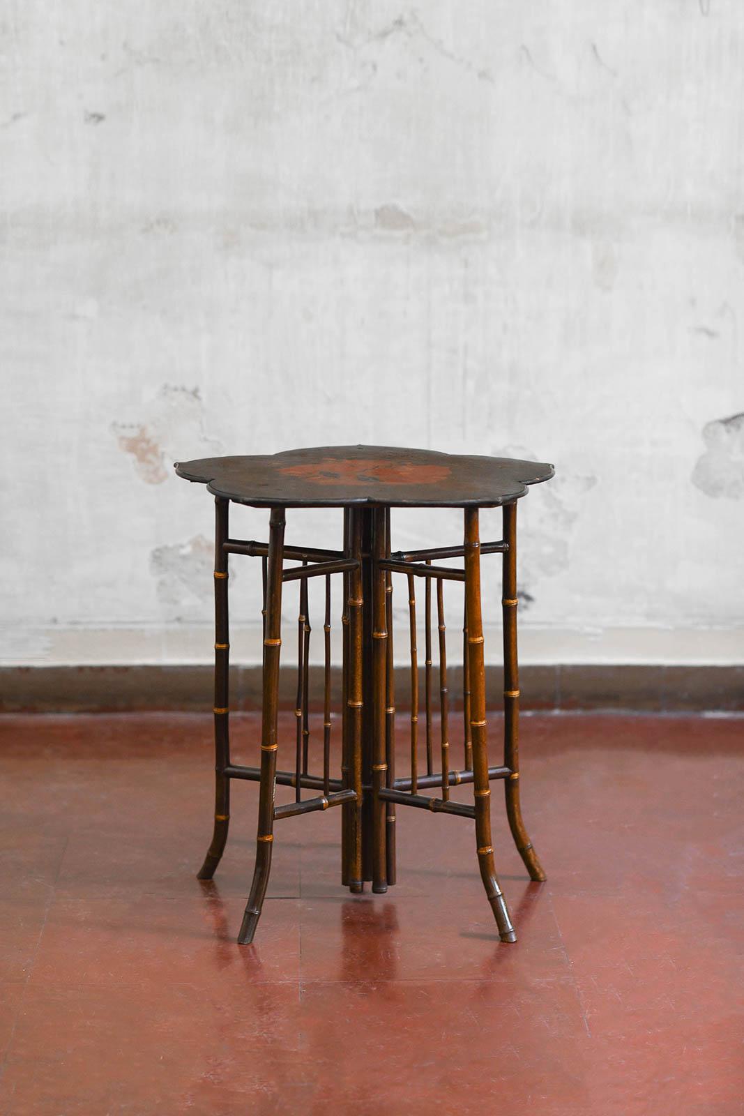 Bamboo and lacquered wood table attributed to Perret & Vibert, France late 19th century.
Product details
From the residence of Antonello Falqui – Falqui Collection.
Bamboo and wood coffee table with red lacquered detail and a palilobate top in the