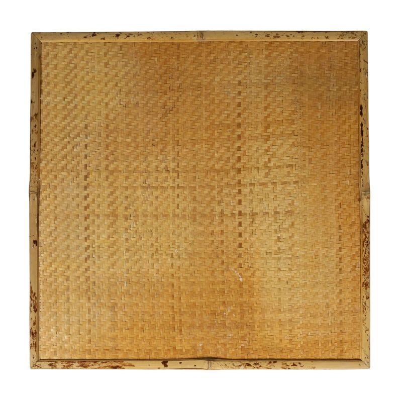 A vintage bamboo and woven raffia games table that features a captivating woven raffia top that adds a touch of timeless sophistication to its design. This table combines the natural beauty of bamboo and the artful craftsmanship of woven raffia to