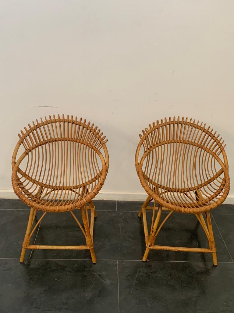 Bamboo Armchairs attributed to Franco Albini, 1950s, Set of 2.
Piece attributed to the above designer/maker. It has no hallmark or proof of authenticity, but is documented in design history. 
Packaging with bubble wrap and cardboard boxes is