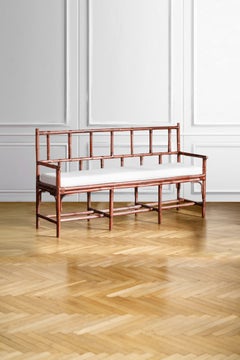 Banc en bambou avec reliure en cuir et coussin en tissu Dedar